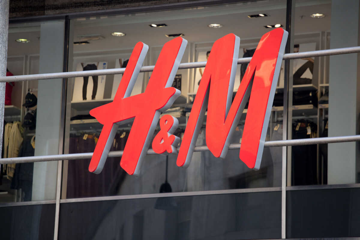 Milan, Italy - September 27, 2011: Close up of the logo for the H&M store in Milan, Italy. H&M is a Swedish clothing company with over 2,200 stores worldwide.
