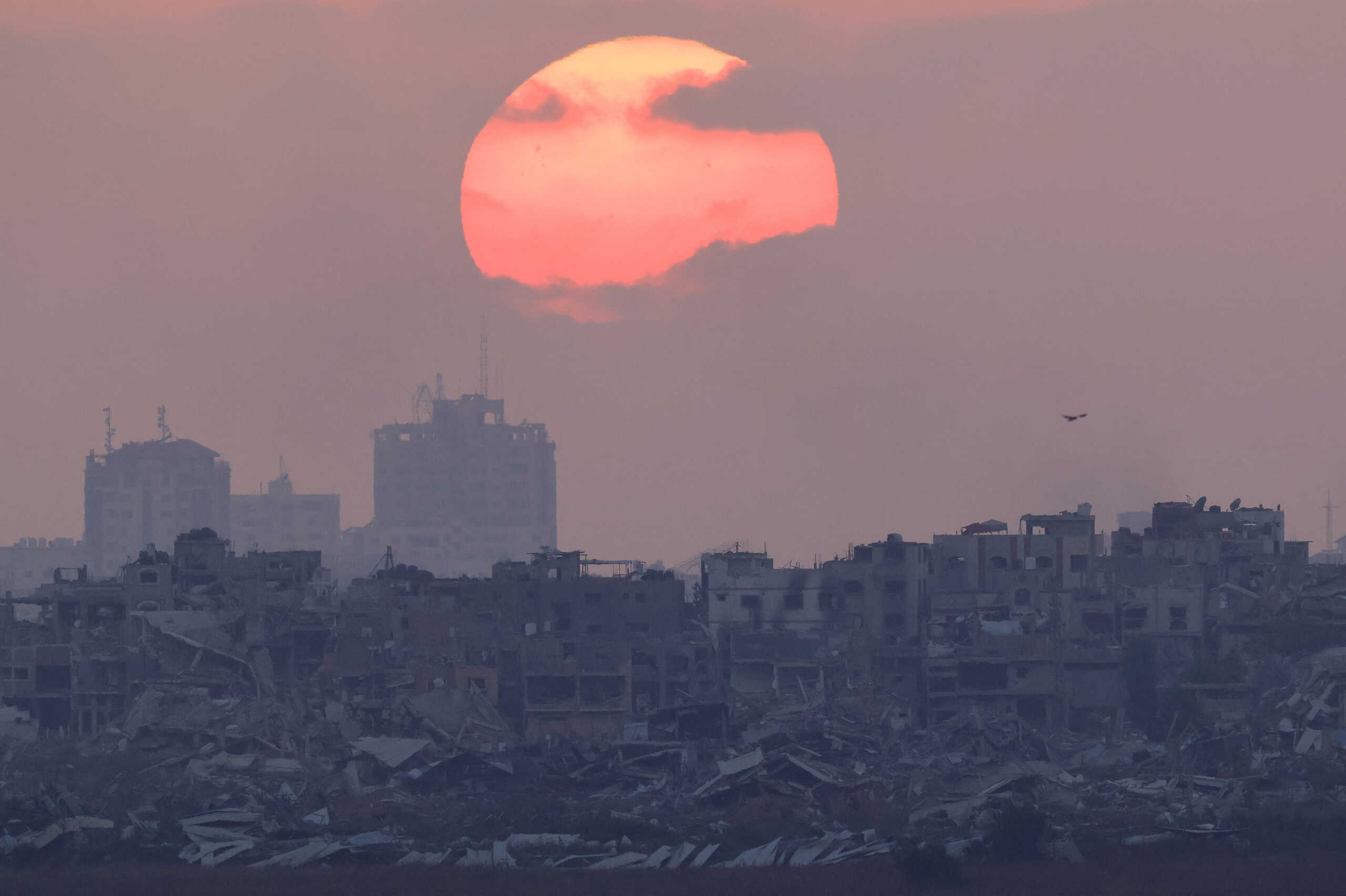 The sun sets over Gaza, amid the Israel-Hamas conflict, as seen from Israel, June 27, 2024. REUTERS