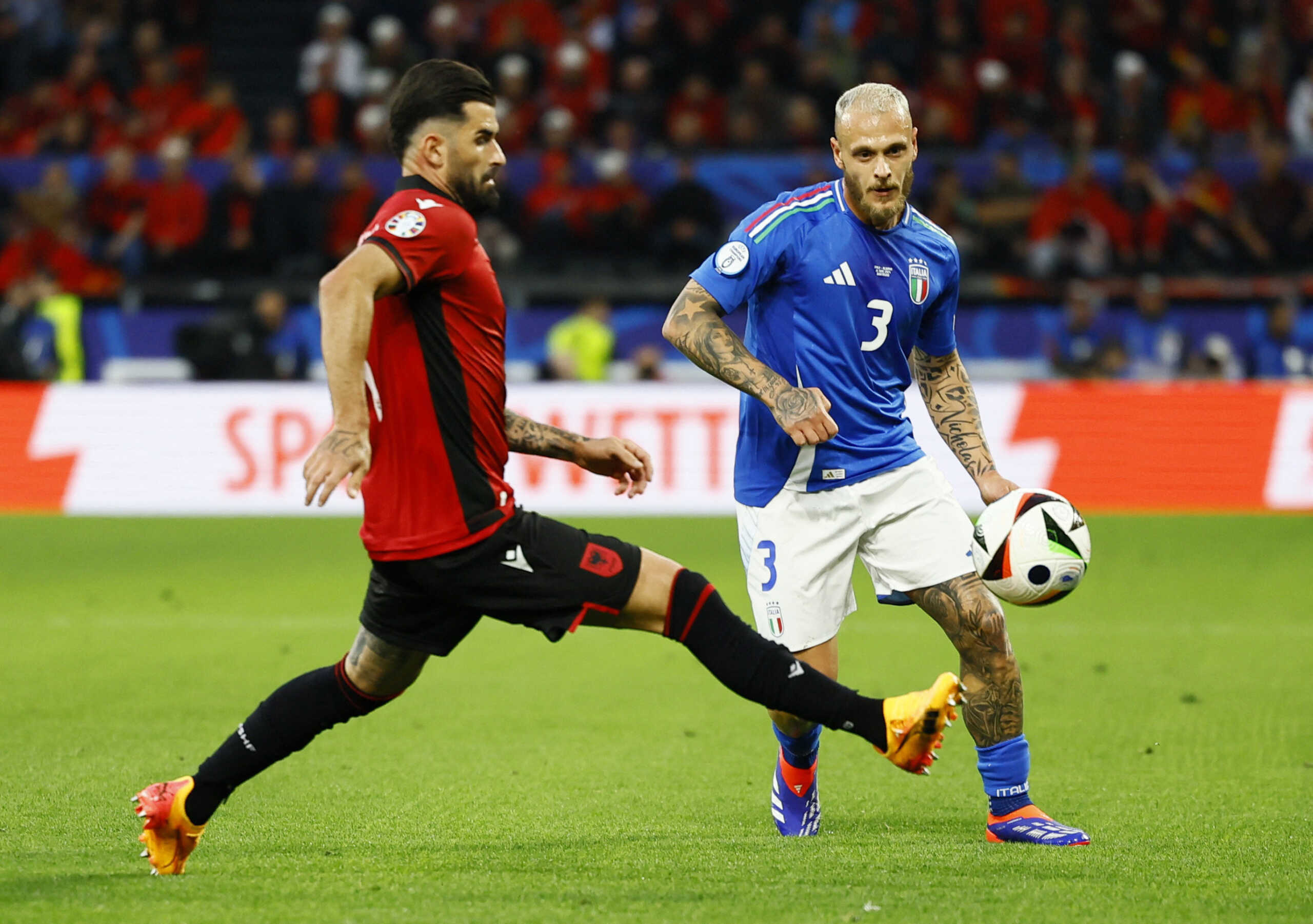 Soccer Football - Euro 2024 - Group B - Italy v Albania - Dortmund BVB Stadion, Dortmund, Germany - June 15, 2024 Albania's Elseid Hysaj in action with Italy's Federico Dimarco REUTERS