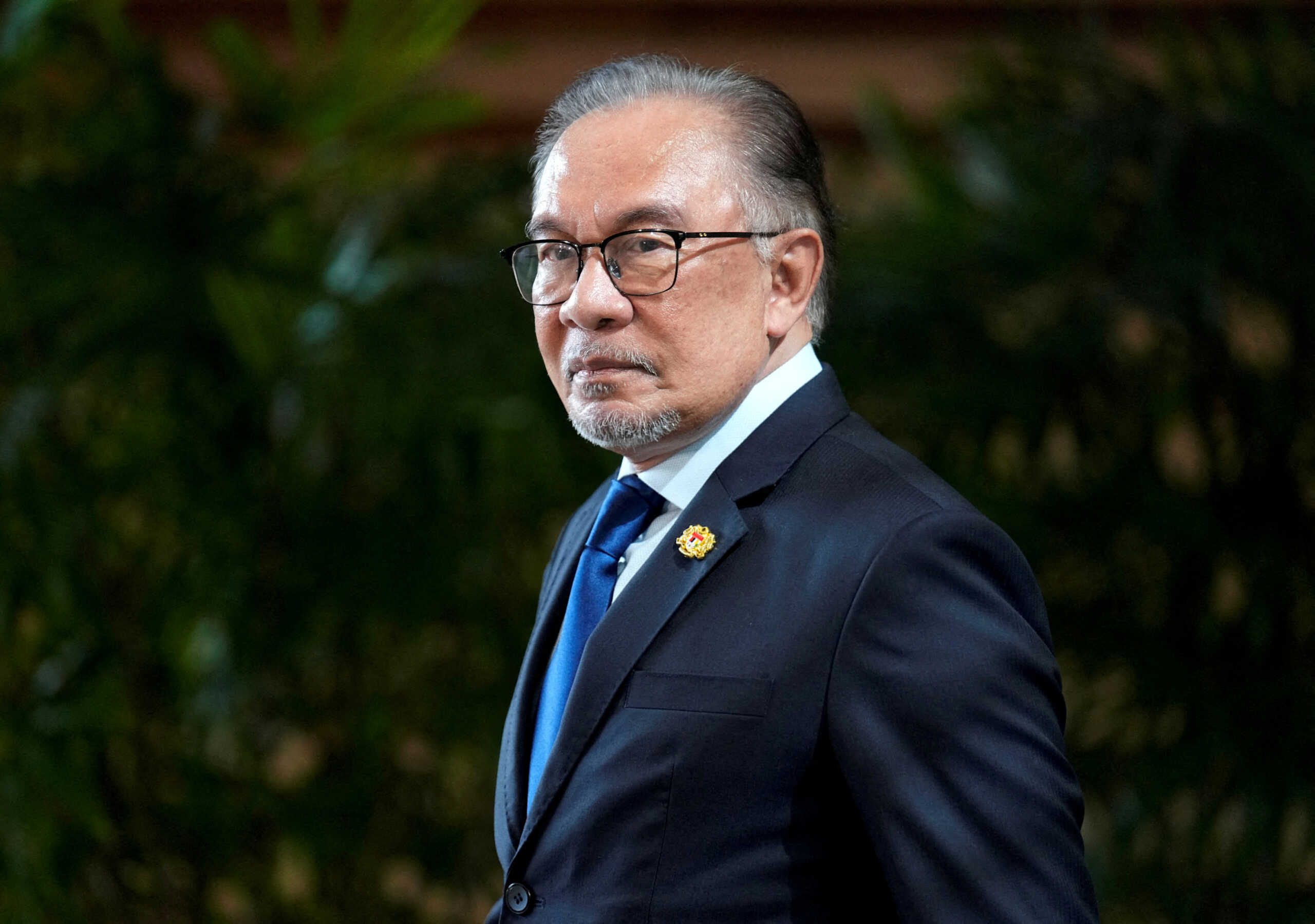 FILE PHOTO: FILE PHOTO: Malaysian Prime Minister Anwar Ibrahim leaves Japan's prime minister's official residence after a meeting with Japanese Prime Minister Fumio Kishida in Tokyo, Japan, May 23, 2024.   FRANCK ROBICHON