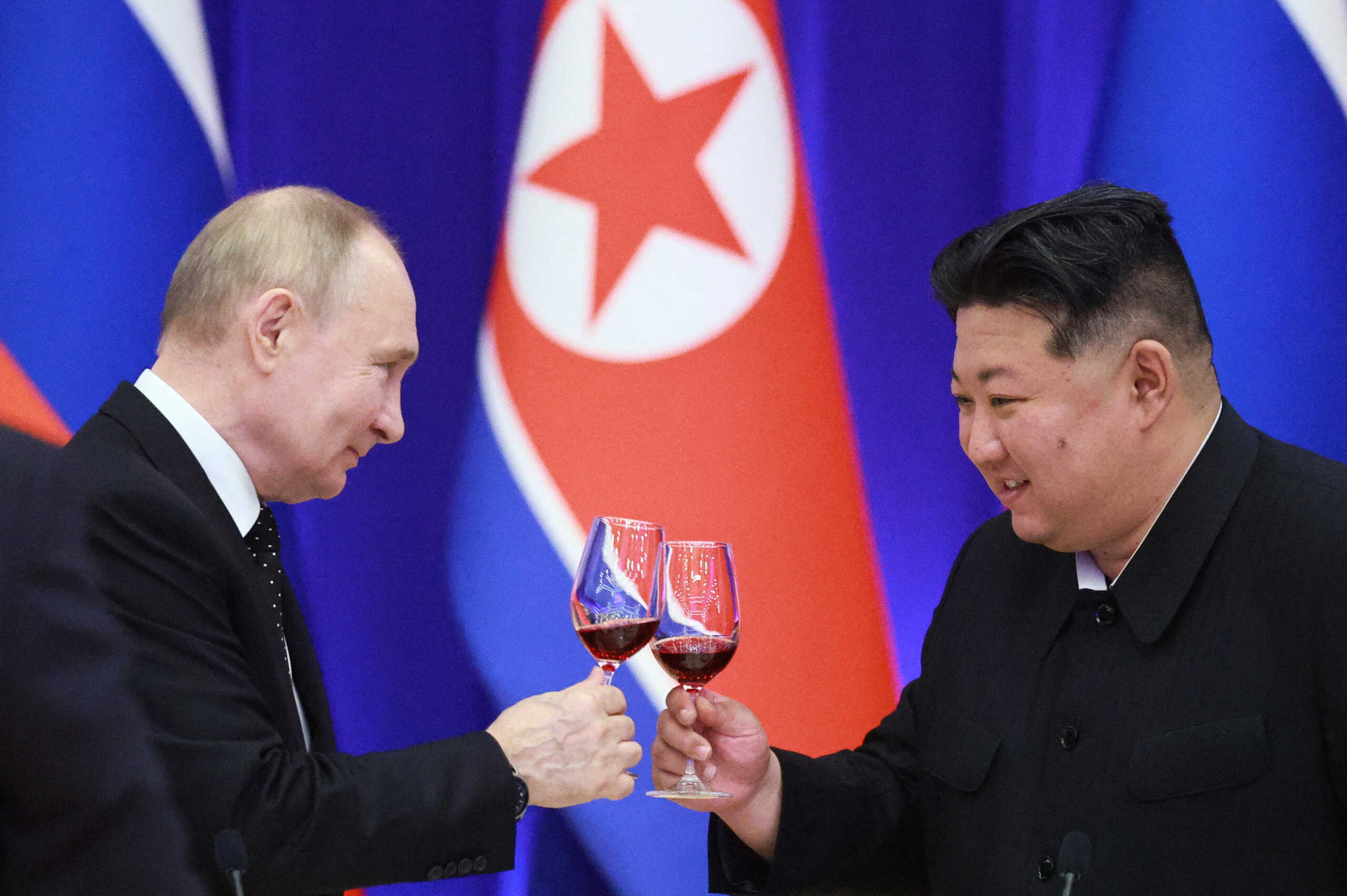 Russia's President Vladimir Putin and North Korea's leader Kim Jong Un attend a state reception in Pyongyang, North Korea June 19, 2024. Sputnik
