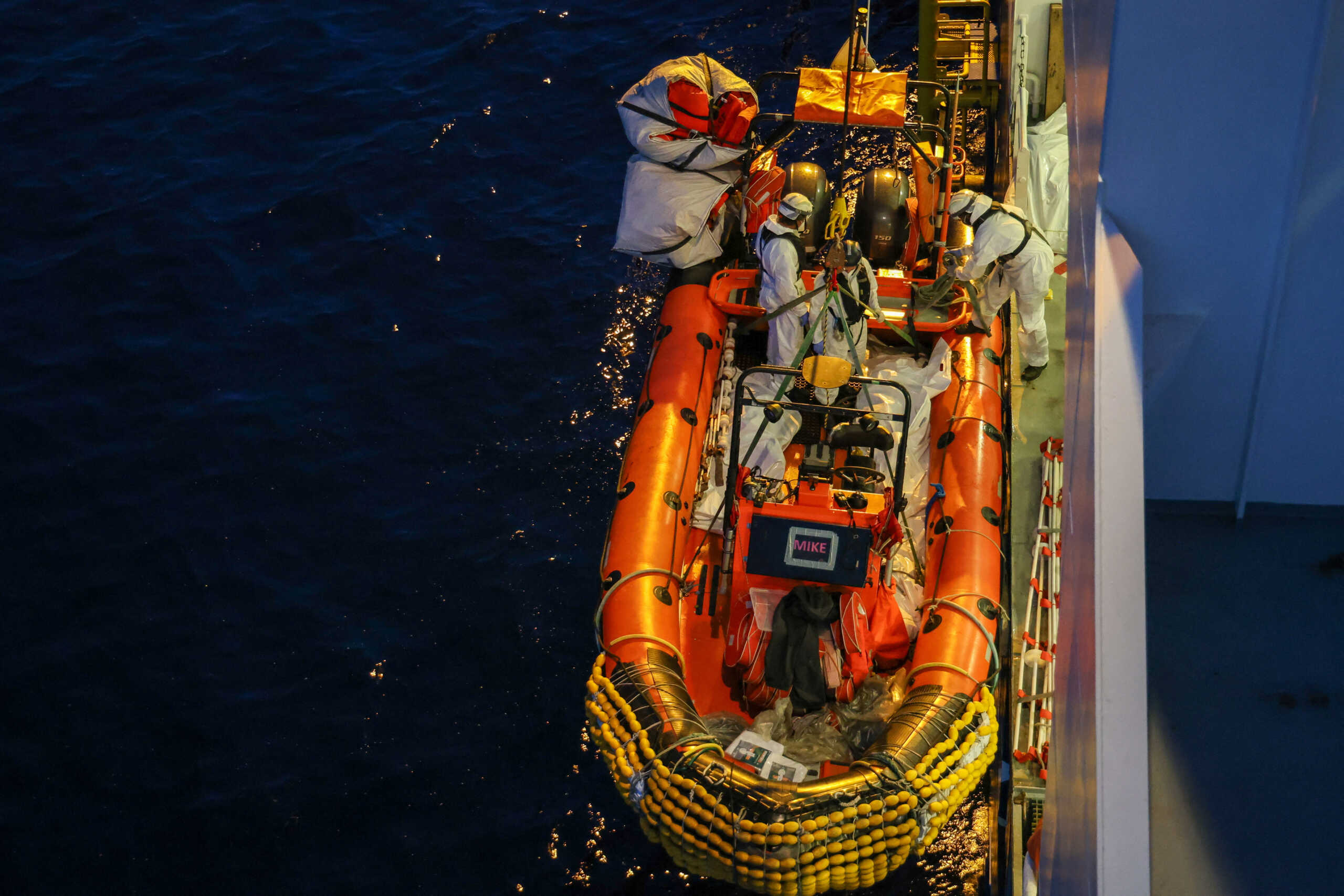 Handout image shows Medecins Sans Frontieres (MSF) teams retriving dead bodies of migrants in body bags from the Mediterranean sea June 7, 2024. MSF