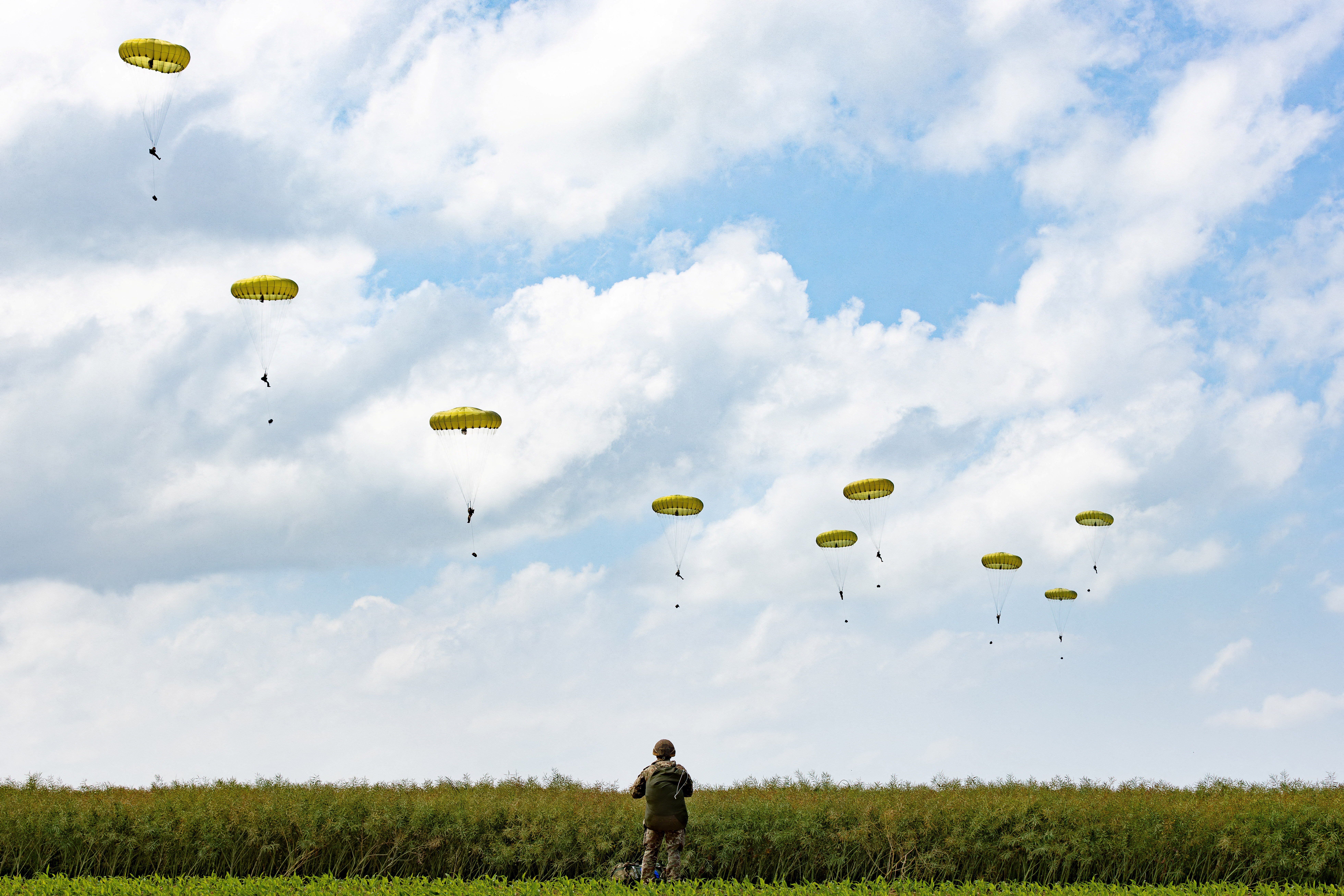 Paratroopers jump into Normandy to pay tribute to the soldiers who parachuted in on D-Day, in Sannerville, Normandy, France, June 5, 2024. UK MOD Crown copyright 2024