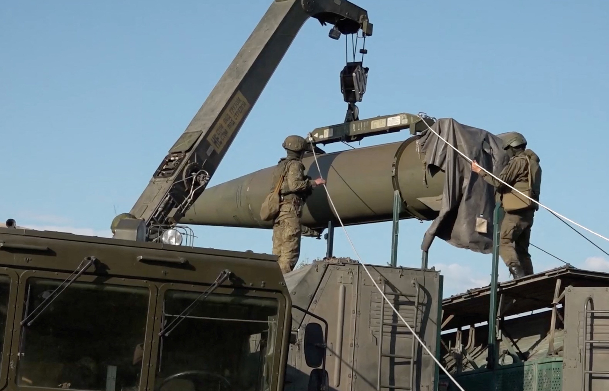 Russian service members take part in the first stage of military drills, involving practical training in the preparation and use of non-strategic nuclear weapons, at an unknown location in Russia's Southern Military District, in this still image taken from video released May 21, 2024. Russian Defence Ministry