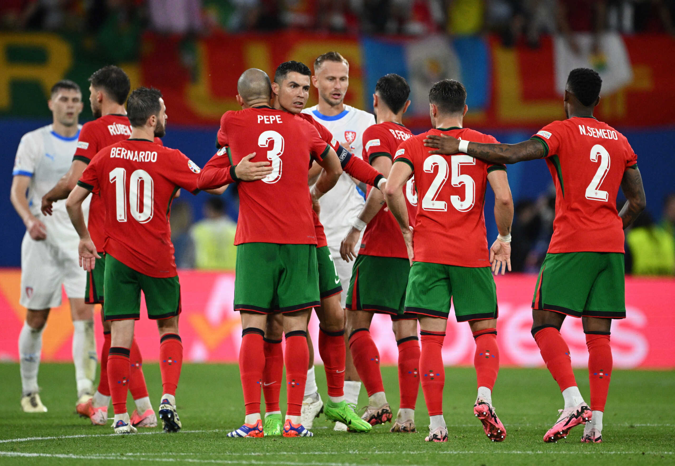Soccer Football - Euro 2024 - Group F - Portugal v Czech Republic - Leipzig Stadium, Leipzig, Germany - June 18, 2024  Portugal's Cristiano Ronaldo and Pepe celebrate after the match REUTERS