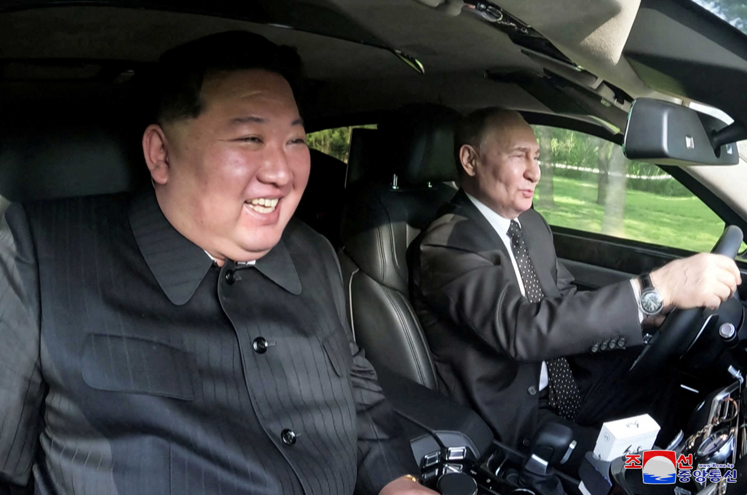 Russia's President Vladimir Putin and North Korea's leader Kim Jong Un ride an Aurus car in Pyongyang, North Korea in this image released by the Korean Central News Agency June 20, 2024.    KCNA via REUTERS    ATTENTION EDITORS - THIS IMAGE WAS PROVIDED BY A THIRD PARTY. REUTERS IS UNABLE TO INDEPENDENTLY VERIFY THIS IMAGE. NO THIRD PARTY SALES. SOUTH KOREA OUT. NO COMMERCIAL OR EDITORIAL SALES IN SOUTH KOREA.     TPX IMAGES OF THE DAY