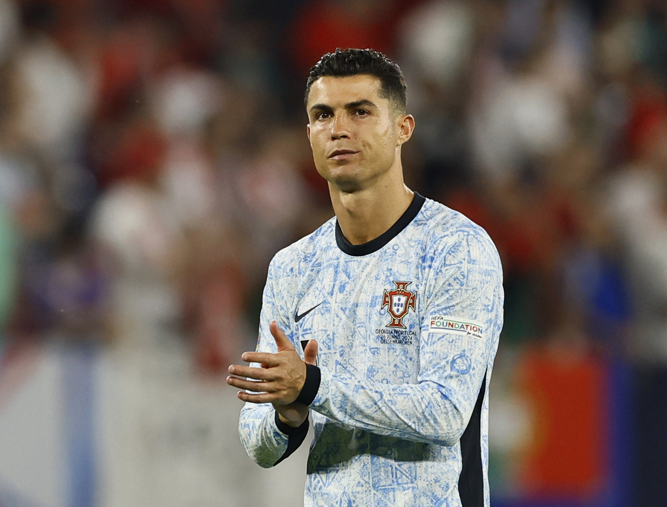Soccer Football - Euro 2024 - Group F - Georgia v Portugal - Arena AufSchalke, Gelsenkirchen, Germany - June 26, 2024  Portugal's Cristiano Ronaldo looks dejected after the match REUTERS