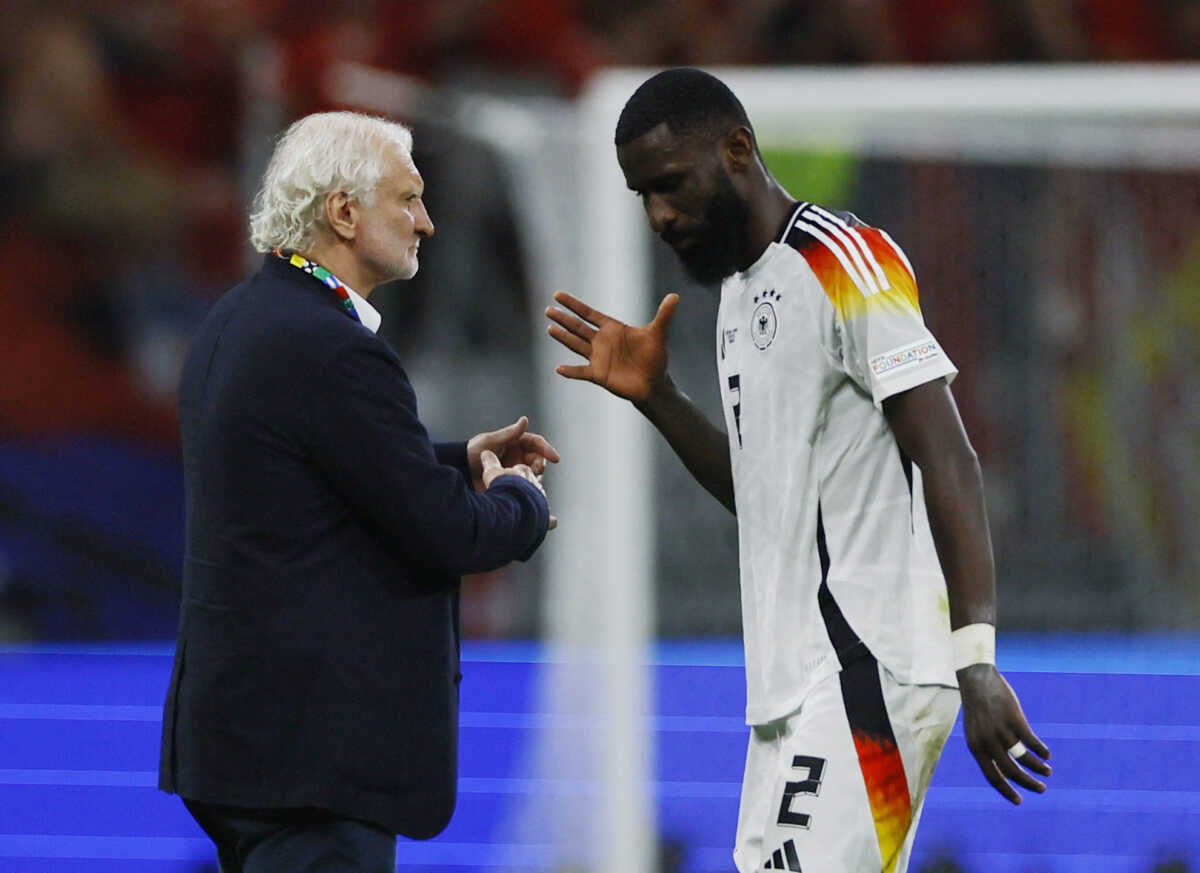 Soccer Football - Euro 2024 - Group A - Switzerland v Germany - Frankfurt, Germany - June 23, 2024 Germany's Antonio Rudiger with DFB sporting director Rudi Voller after the match REUTERS