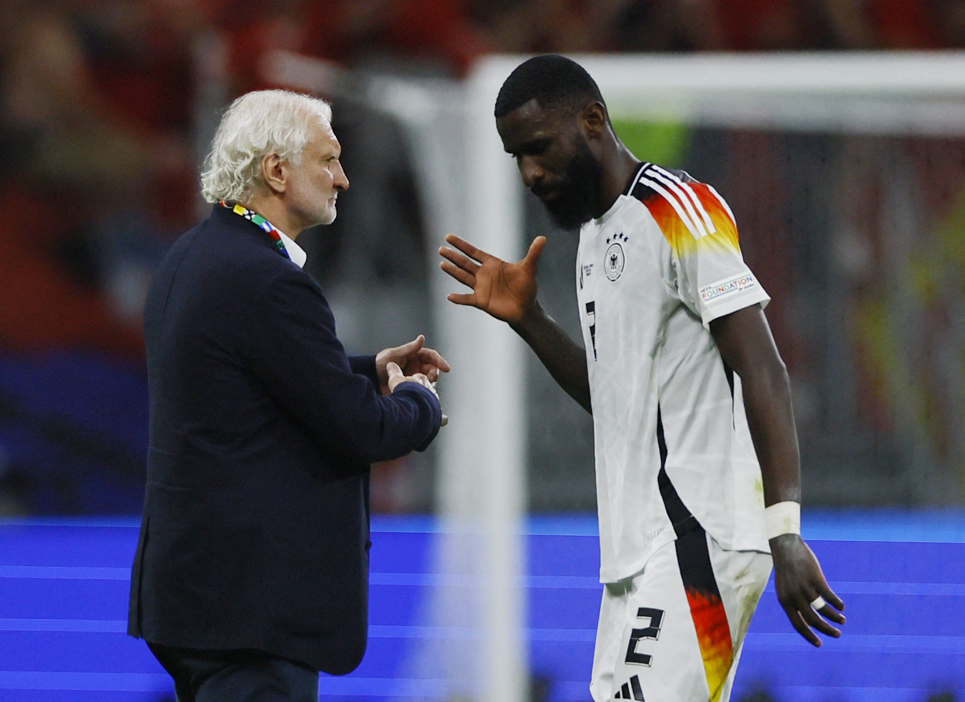 Soccer Football - Euro 2024 - Group A - Switzerland v Germany - Frankfurt, Germany - June 23, 2024 Germany's Antonio Rudiger with DFB sporting director Rudi Voller after the match REUTERS