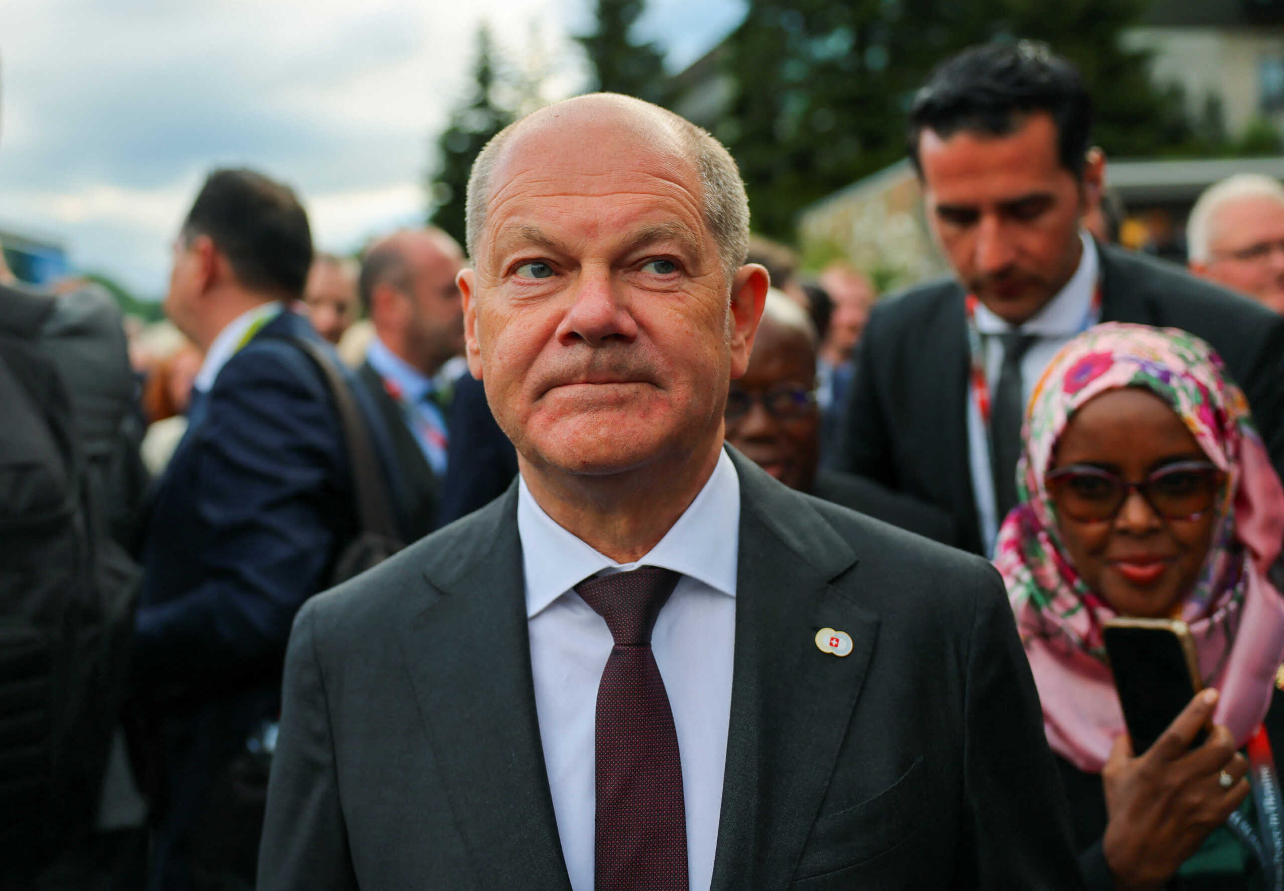 German Chancellor Olaf Scholz attends a family photo session, on the day of the opening ceremony of the Summit on Peace in Ukraine at the Buergenstock Resort in Stansstad near Lucerne, Switzerland, June 15, 2024. REUTERS