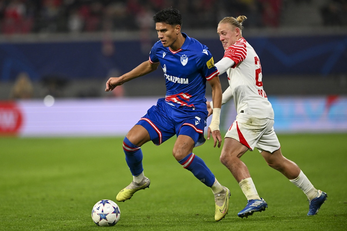 epa10939340 Red Star's Marko Stamenic (L) in action against Leipzig's Xaver Schlager during the UEFA Champions League group G soccer match between RB Leipzig and Red Star Belgrade,  in Leipzig, Germany, 25 October 2023.  EPA