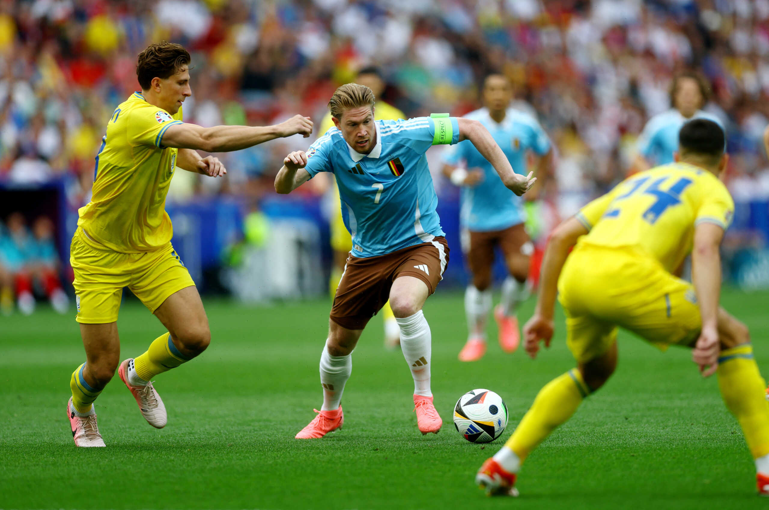 Soccer Football - Euro 2024 - Group E - Ukraine v Belgium - Stuttgart Arena, Stuttgart, Germany - June 26, 2024 Belgium's Kevin De Bruyne in action with Ukraine's Illia Zabarnyi REUTERS