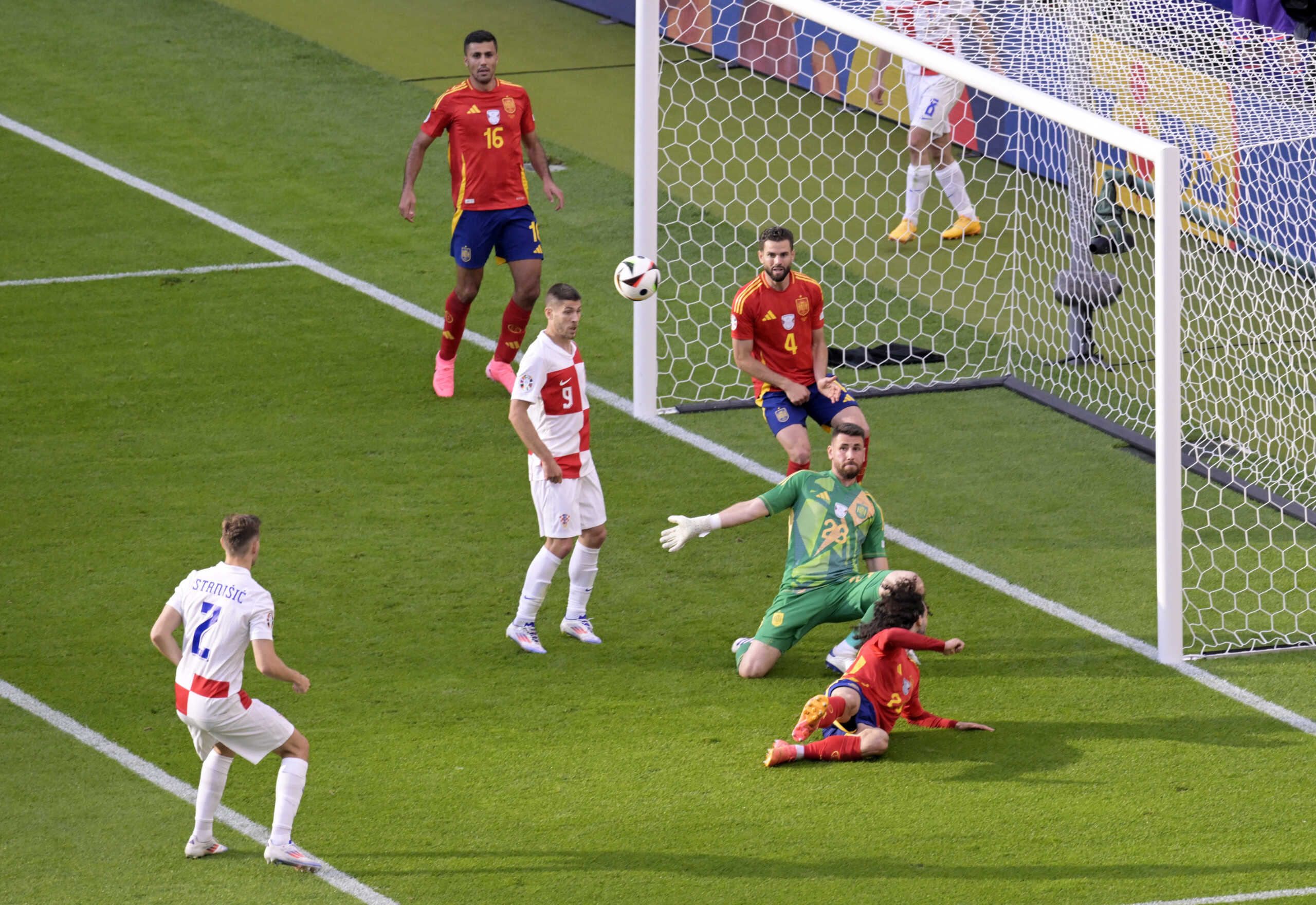 Soccer Football - Euro 2024 - Group B - Spain v Croatia - Berlin Olympiastadion, Berlin, Germany - June 15, 2024  Croatia's Andrej Kramaric and Josip Stanisic in action with Spain's Unai Simon and Marc Cucurella REUTERS