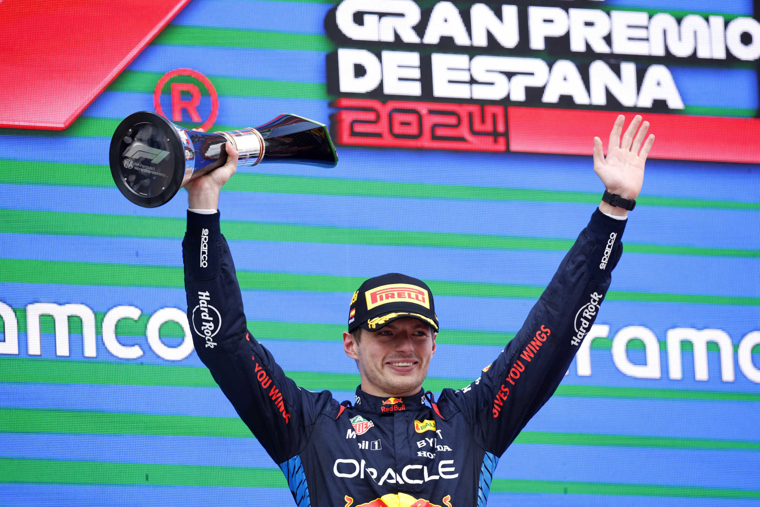 Formula One F1 - Spanish Grand Prix - Circuit de Barcelona-Catalunya, Barcelona, Spain - June 23, 2024 Red Bull's Max Verstappen celebrates with a trophy on the podium after winning the Spanish Grand Prix REUTERS