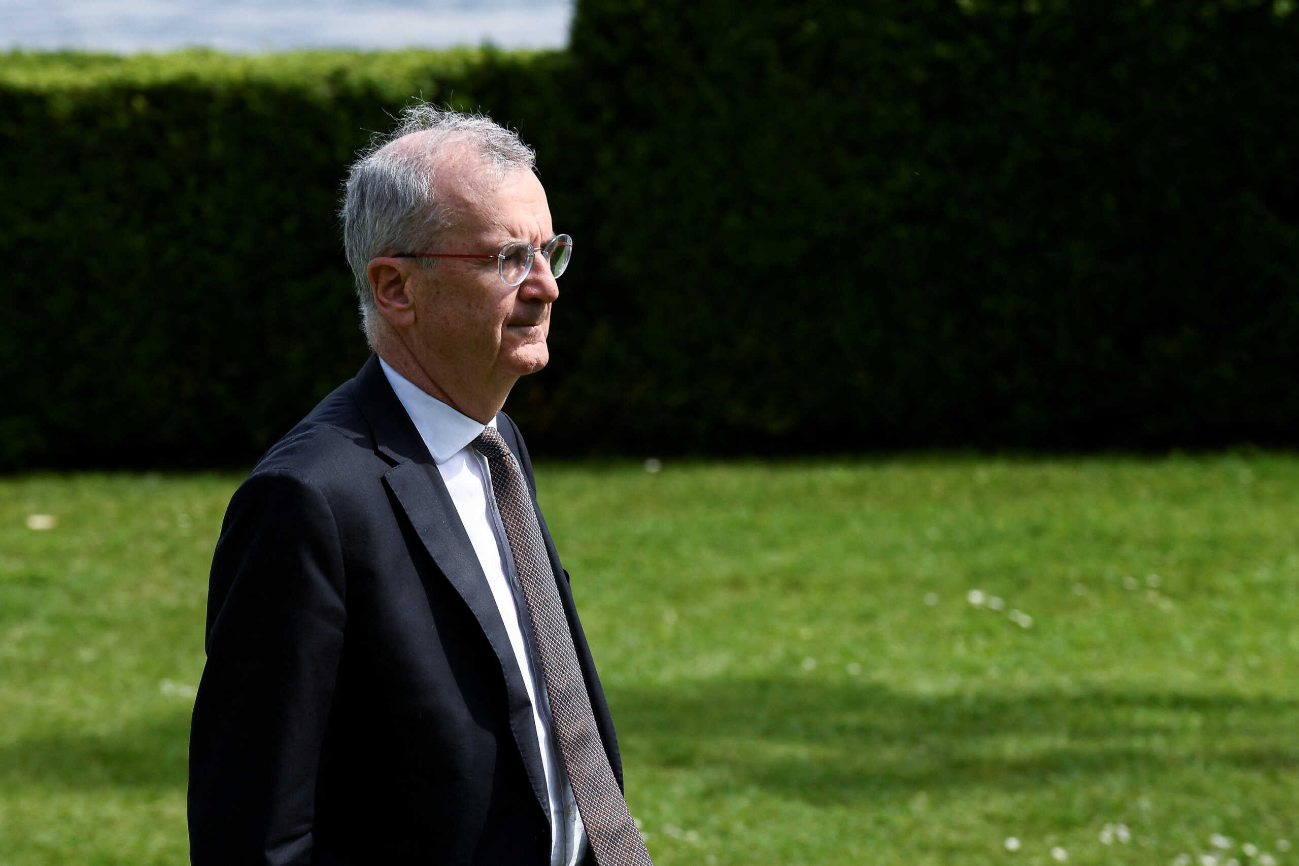 Bank of France Governor Francois Villeroy de Galhau walks on the final day of the G7 Finance Ministers and Central Bank Governors' Meeting in Stresa, Italy May 25, 2024. REUTERS