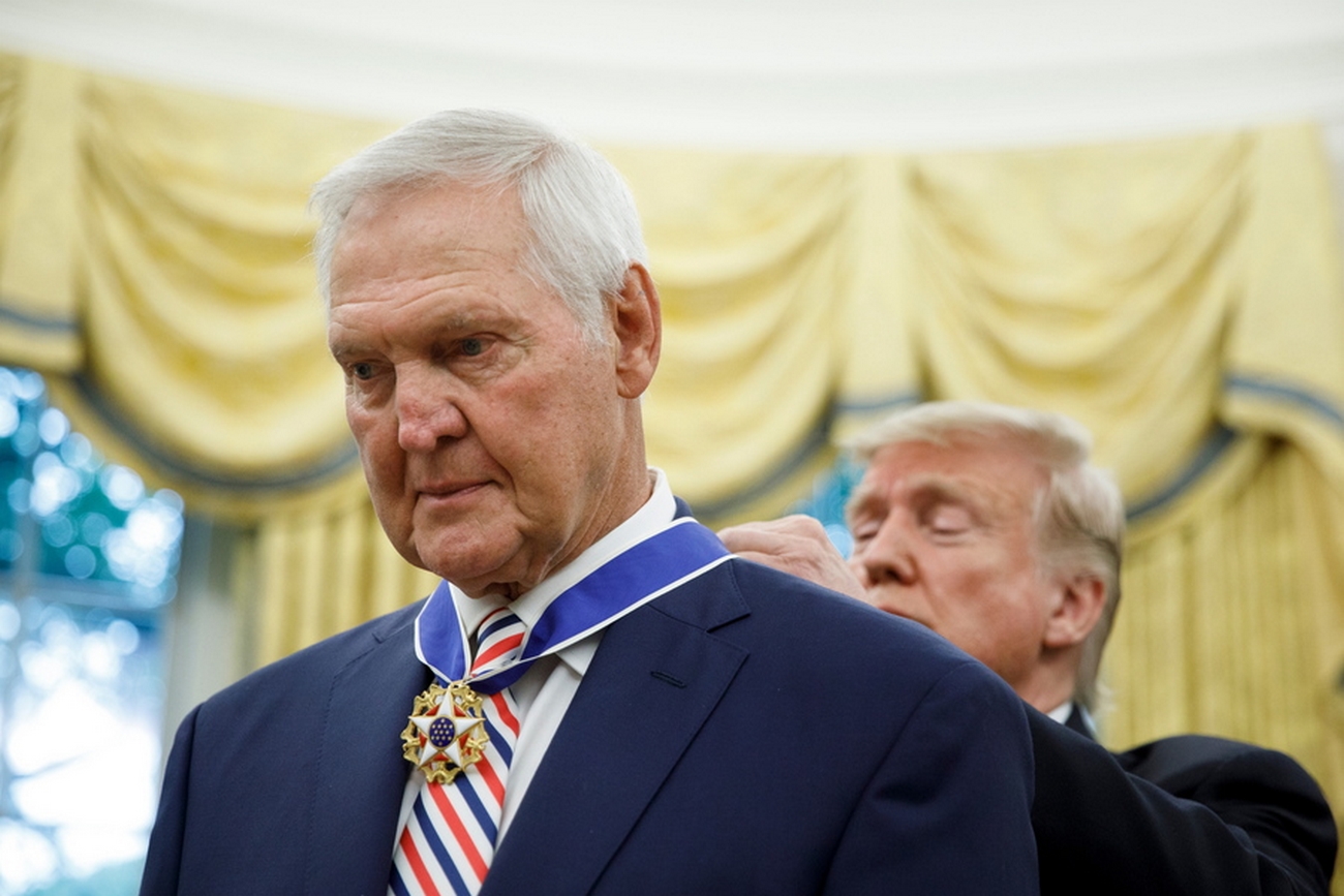 epa07821282 US President Donald J. Trump (R) presents the Presidential Medal of Freedom to NBA Hall of Fame member Jerry West (L) during a ceremony inside of the Oval Office at the White House in Washington, DC, USA, 05 September 2019. West, 81, graduated from West Virginia University and played fourteen seasons with the Los Angeles Lakers.  EPA