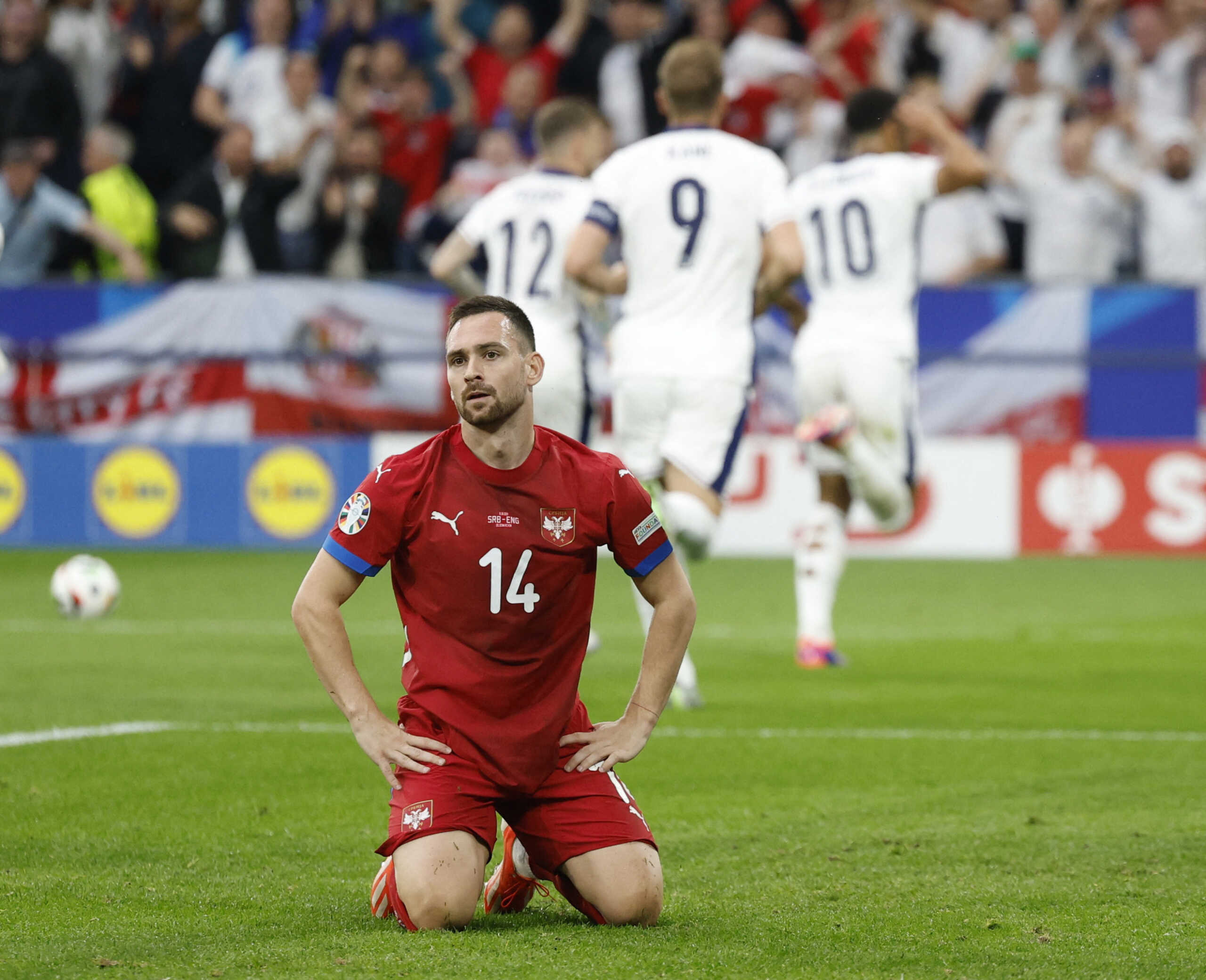 Soccer Football - Euro 2024 - Group C - Serbia v England - Arena AufSchalke, Gelsenkirchen, Germany - June 16, 2024 Serbia's Andrija Zivkovic looks dejected after England's Jude Bellingham scores their first goal REUTERS