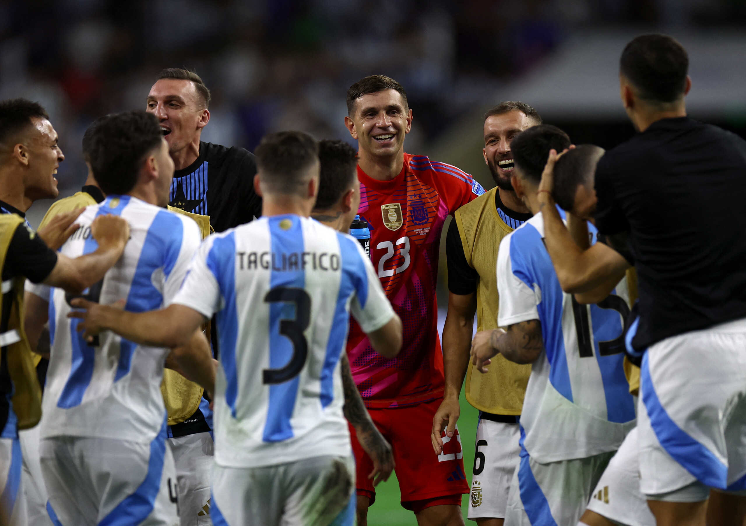 Soccer Football - Copa America 2024 - Quarter Final - Argentina v Ecuador - NRG Stadium, Houston, Texas, United States - July 4, 2024 Argentina's Emiliano Martinez and teammates celebrate after winning the penalty shootout REUTERS