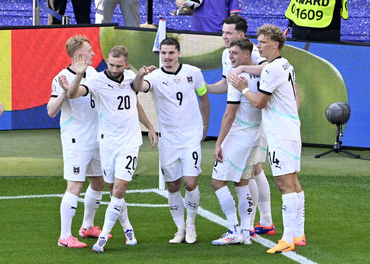Soccer Football - Euro 2024 - Group D - Netherlands v Austria - Berlin Olympiastadion, Berlin, Germany - June 25, 2024 Austria's Marcel Sabitzer celebrates scoring their third goal with teammates REUTERS
