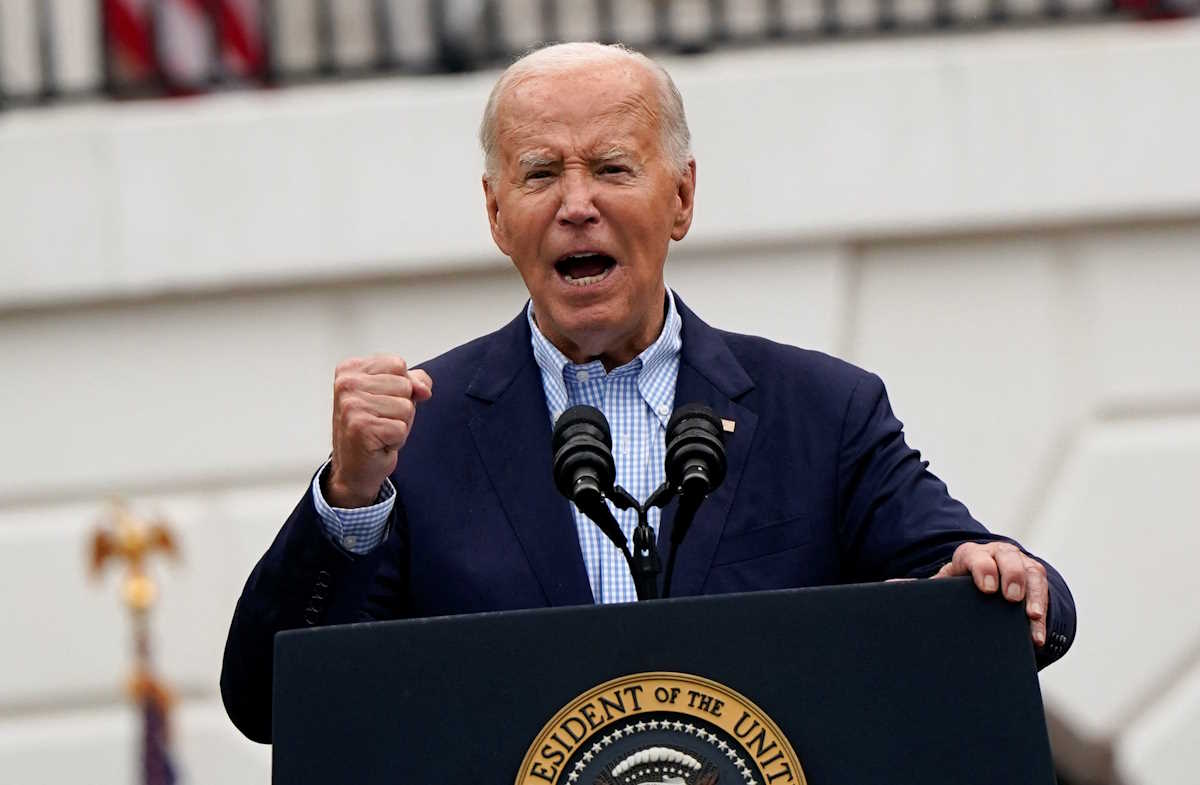U.S. President Joe Biden speaks during a July Fourth barbecue for active-duty U.S. military members and their families at the White House in Washington, U.S., July 4, 2024. REUTERS