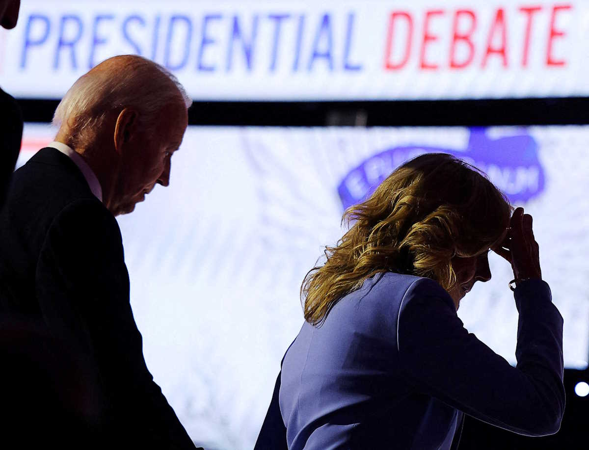 FILE PHOTO: Democrat candidate U.S. President Joe Biden walks offstage with first lady Dr. Jill Biden at the conclusion of a presidential debate with Republican presidential candidate former U.S. President Donald Trump, in Atlanta, Georgia, U.S., June 27, 2024. REUTERS