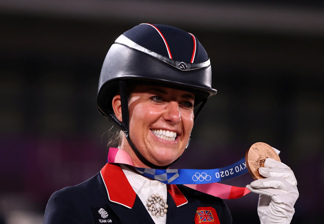 FILE PHOTO: Tokyo 2020 Olympics - Equestrian - Dressage - Team - Medal Ceremony - Equestrian Park - Tokyo, Japan - July 27, 2021. Charlotte Dujardin of Britain poses with her bronze medal REUTERS