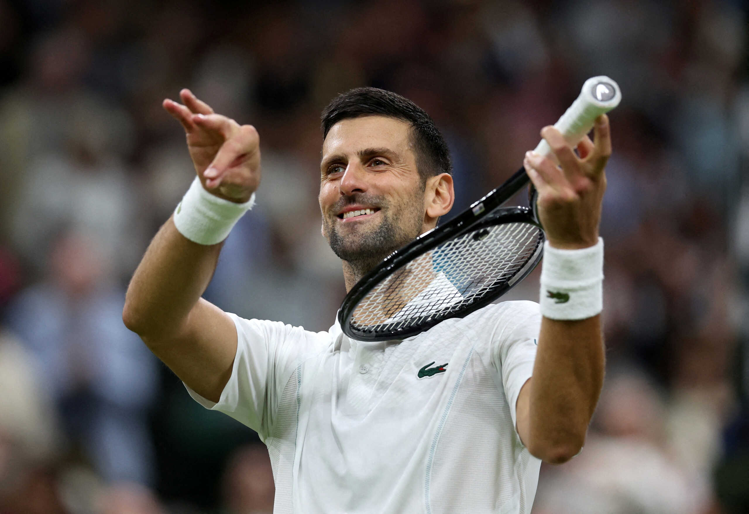 Tennis - Wimbledon - All England Lawn Tennis and Croquet Club, London, Britain - July 8, 2024 Serbia's Novak Djokovic celebrates after winning his fourth round match against Denmark's Holger Rune REUTERS