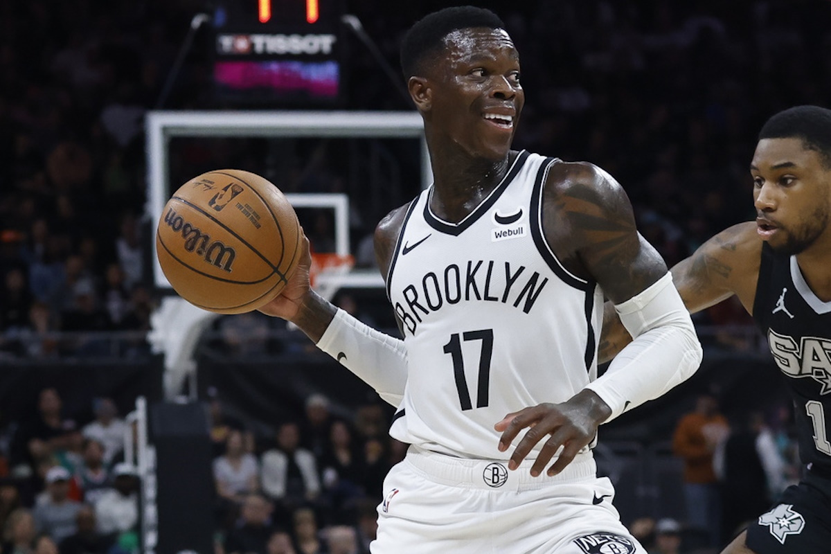epa11227256 Brooklyn Nets guard Dennis Schroder of Germany (L) dribbles past San Antonio Spurs guard Blake Wesley (R) during the first half of an NBA game between the San Antonio Spurs and the Brooklyn Nets in Austin, Texas, USA, 17 March 2024.  EPA