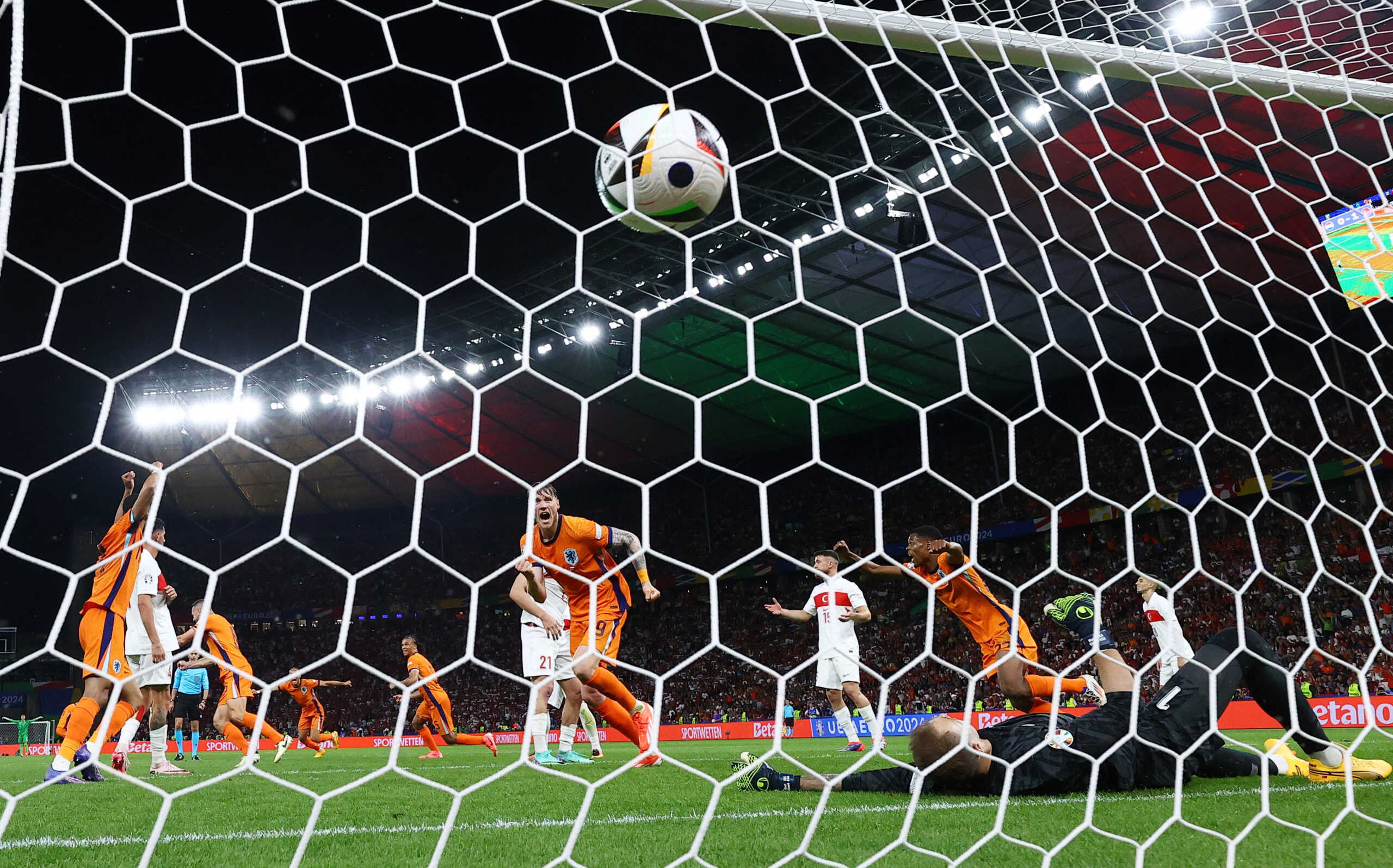 Soccer Football - Euro 2024 - Quarter Final - Netherlands v Turkey - Berlin Olympiastadion, Berlin, Germany - July 6, 2024 Netherlands' Wout Weghorst celebrates after Stefan de Vrij scores their first goal REUTERS