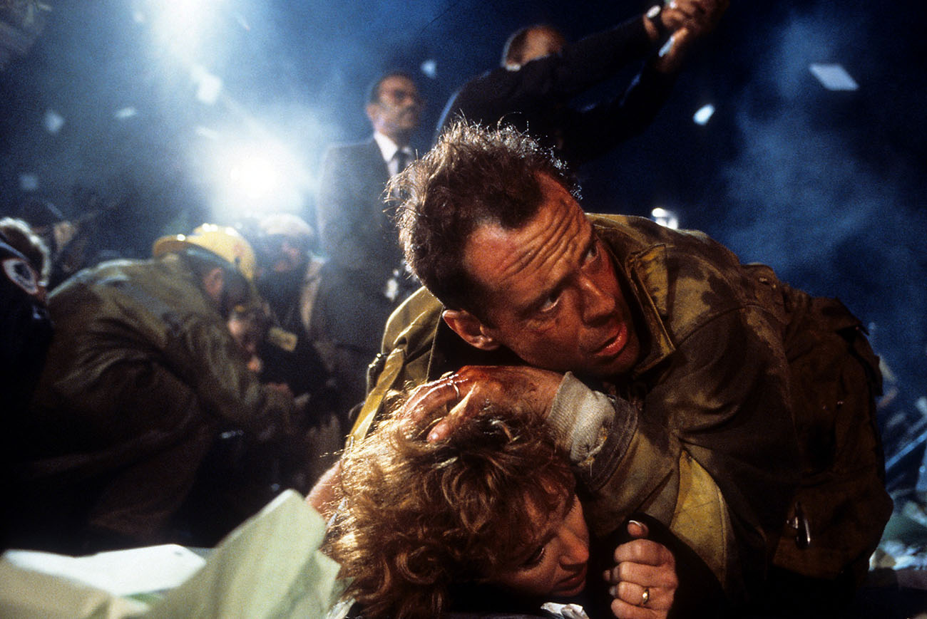Bonnie Bedelia is held down by Bruce Willis in a scene from the film 'Die Hard', 1988. (Photo by 20th Century-Fox