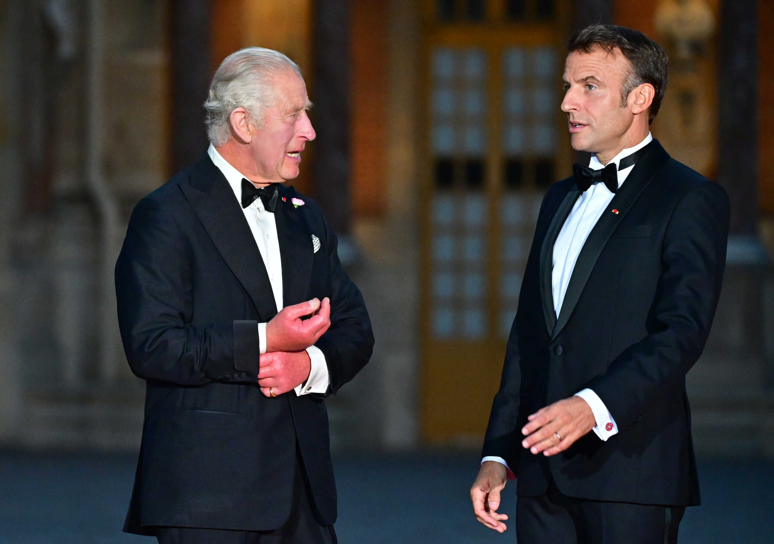 VERSAILLES, FRANCE - SEPTEMBER 20: King Charles III and French President Emmanuel Macron arrive prior to a state dinner at the Chateau de Versailles on September 20, 2023. The King and The Queen's first state visit to France will take place in Paris, Versailles and Bordeaux from Wednesday 20th to Friday 23rd 2023. The visit had been initially scheduled for March 26th - 29th but had to be postponed due to mass strikes and protests. (Photo by Christian Liewig - Corbis
