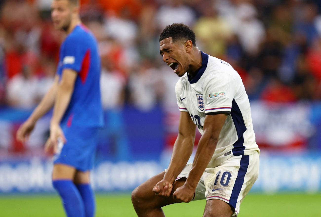 Soccer Football - Euro 2024 - Round of 16 - England v Slovakia - Arena AufSchalke, Gelsenkirchen, Germany - June 30, 2024 England's Jude Bellingham celebrates after Harry Kane scores their second goal REUTERS