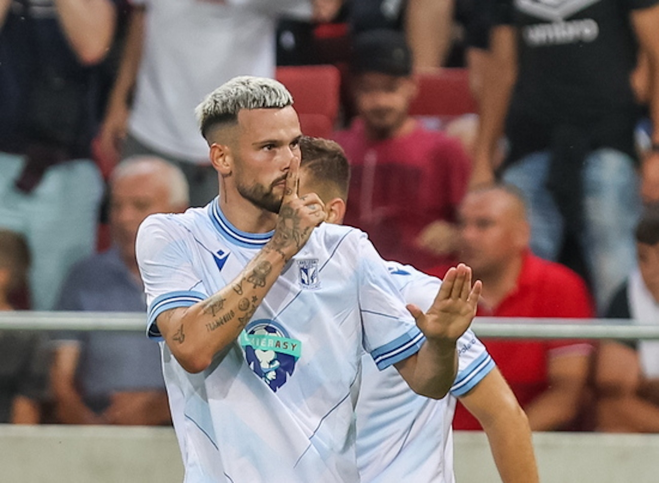 epa10804893 Lech's Kristoffer Velde celebrates after scoring a goal during the UEFA Europa Conference League third qualifying round second leg soccer match between Spartak Trnava vs Lech Poznan in Trnava, Slovakia, 17 August 2023.  EPA