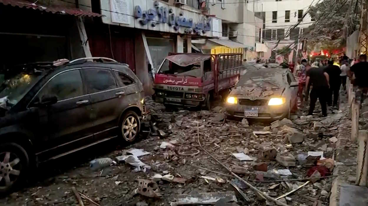 Damaged vehicles are seen after an Israeli strike on Beirut's southern suburbs, Lebanon July 30, 2024 in this screen grab from a video. Reuters TV via REUTERS