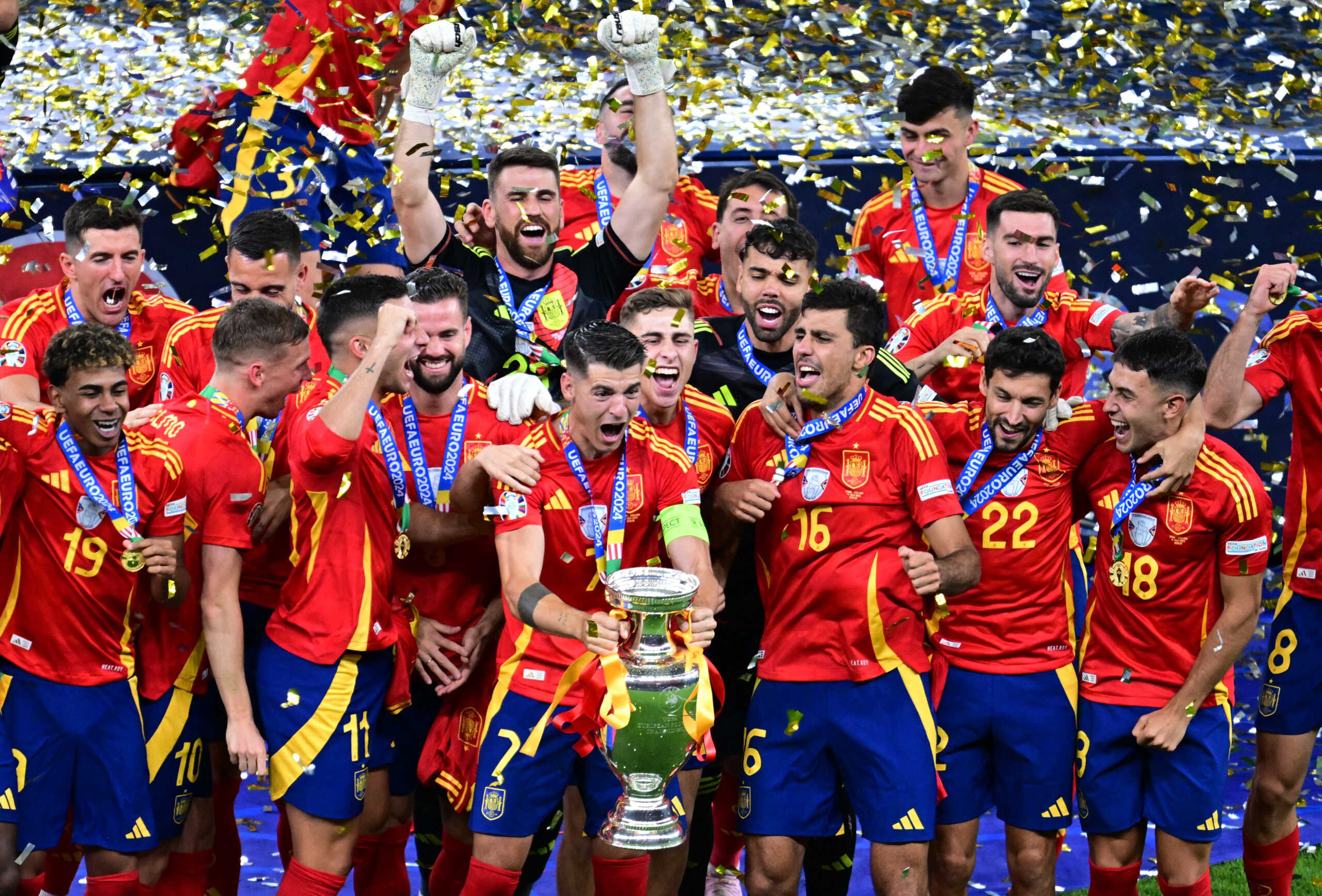Soccer Football - Euro 2024 - Final - Spain v England - Berlin Olympiastadion, Berlin, Germany - July 14, 2024 Spain's Alvaro Morata lifts the trophy as he celebrates with teammates after winning Euro 2024 REUTERS