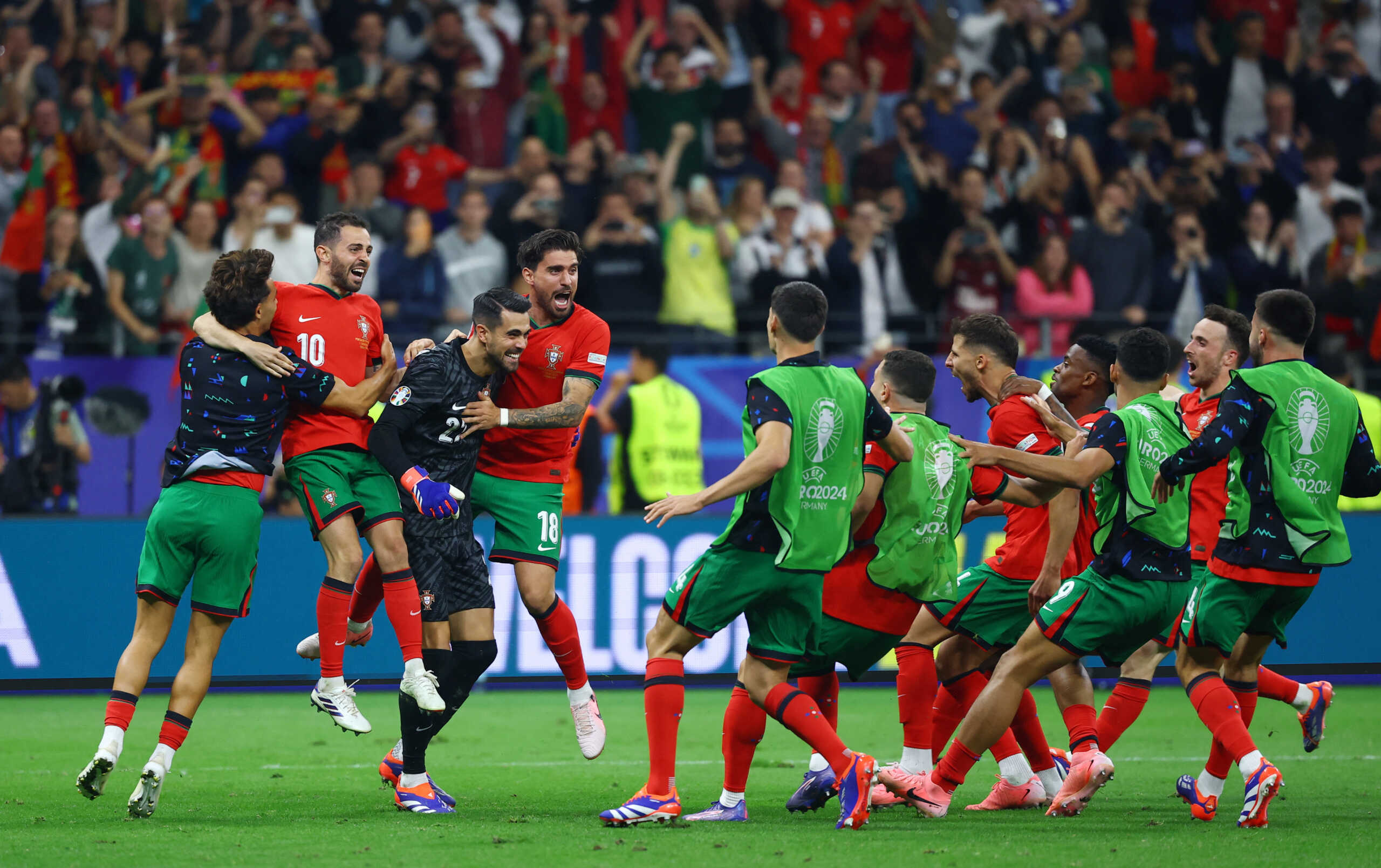 Soccer Football - Euro 2024 - Round of 16 - Portugal v Slovenia - Frankfurt Arena, Frankfurt, Germany - July 1, 2024  Portugal's Diogo Costa with teammates celebrate after winning the penalty shoot-out REUTERS
