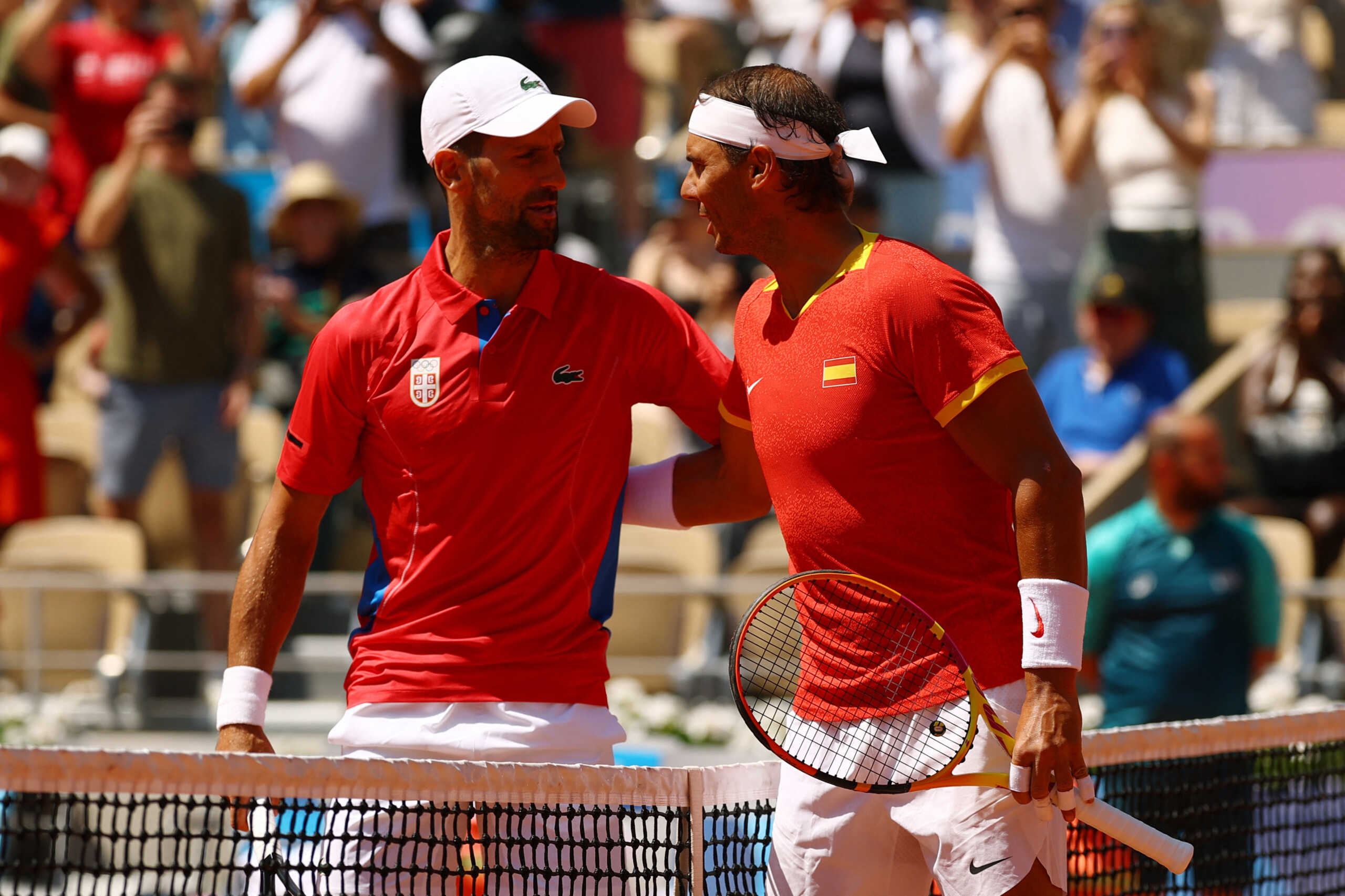 Paris 2024 Olympics - Tennis - Men's Singles Second Round - Roland-Garros Stadium, Paris, France - July 29, 2024. Rafael Nadal of Spain and Novak Djokovic of Serbia pose before their match. REUTERS
