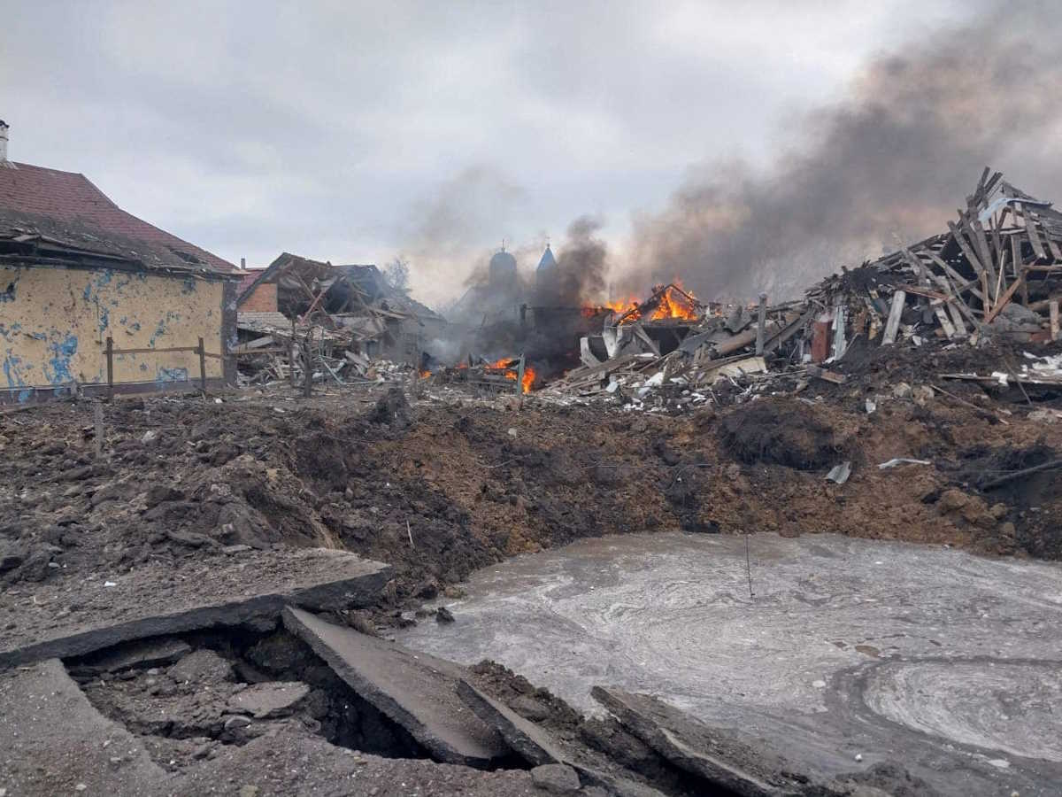FILE PHOTO: A view shows a bomb crater and residential buildings destroyed by a Russian air strike in the village of Borova, amid Russia's attack on Ukraine, in Kharkiv region, Ukraine March 6, 2024. Press service of the National Police of Ukraine in Kharkiv region
