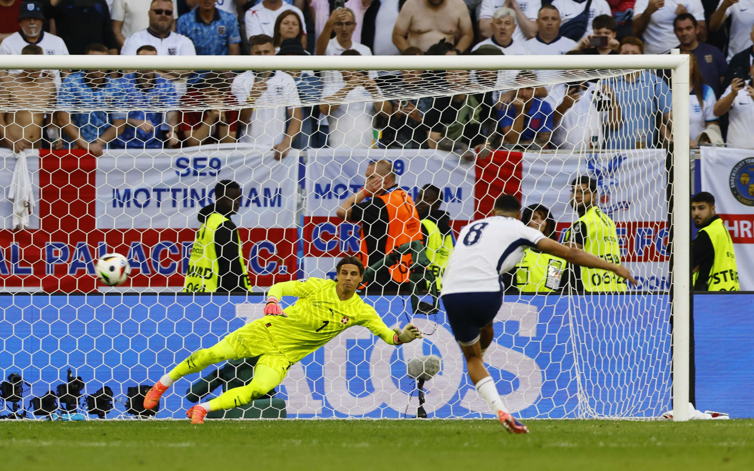 Soccer Football - Euro 2024 - Quarter Final - England v Switzerland - Dusseldorf Arena, Dusseldorf, Germany - July 6, 2024 England's Trent Alexander-Arnold scores a penalty during the penalty shootout REUTERS