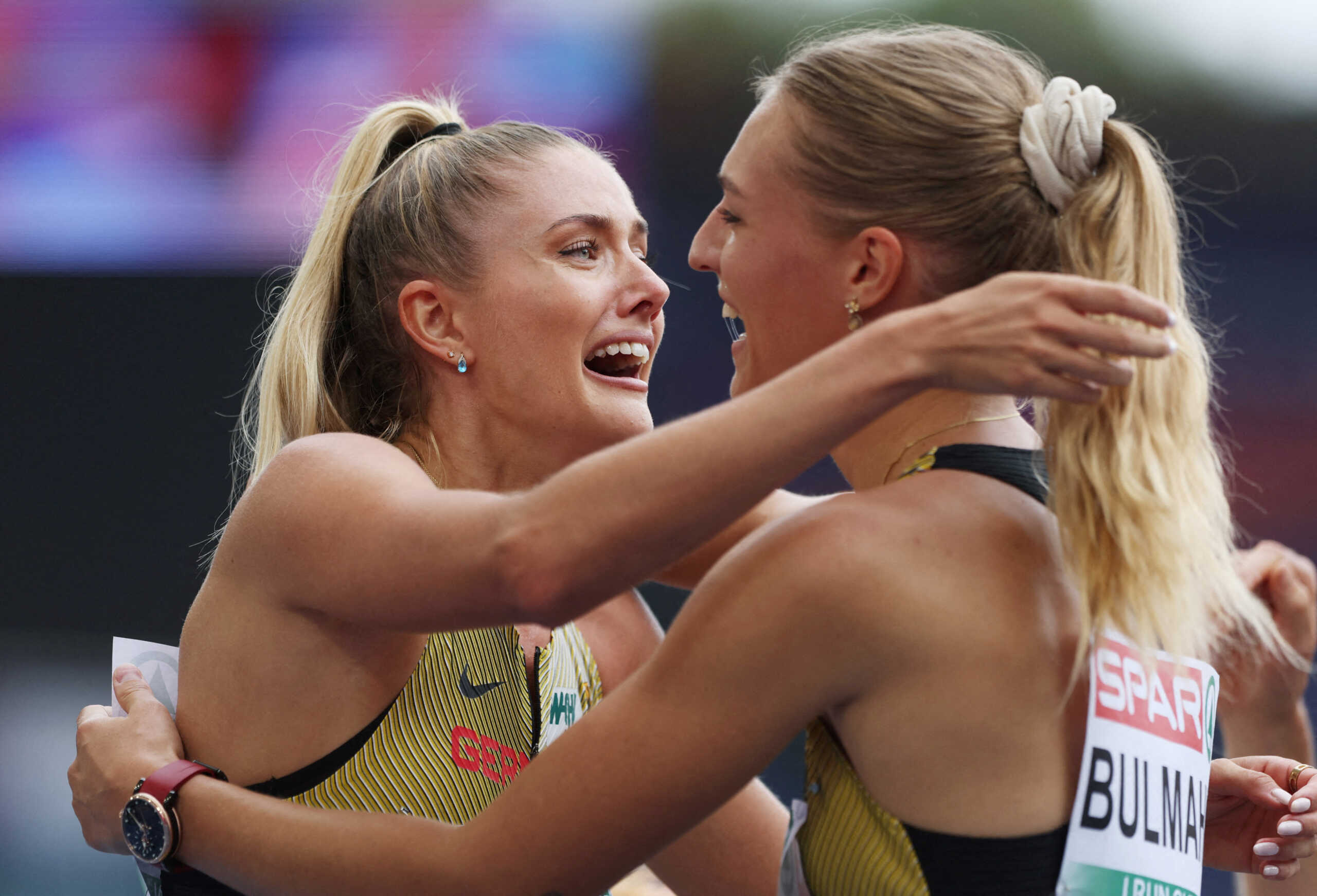 Athletics - European Athletics Championships - Stadio Olimpico, Rome, Italy - June 11, 2024 Germany's Luna Bulmahn celebrates with Alica Schmidt after they finished second in their women's 4x400m relay heat REUTERS