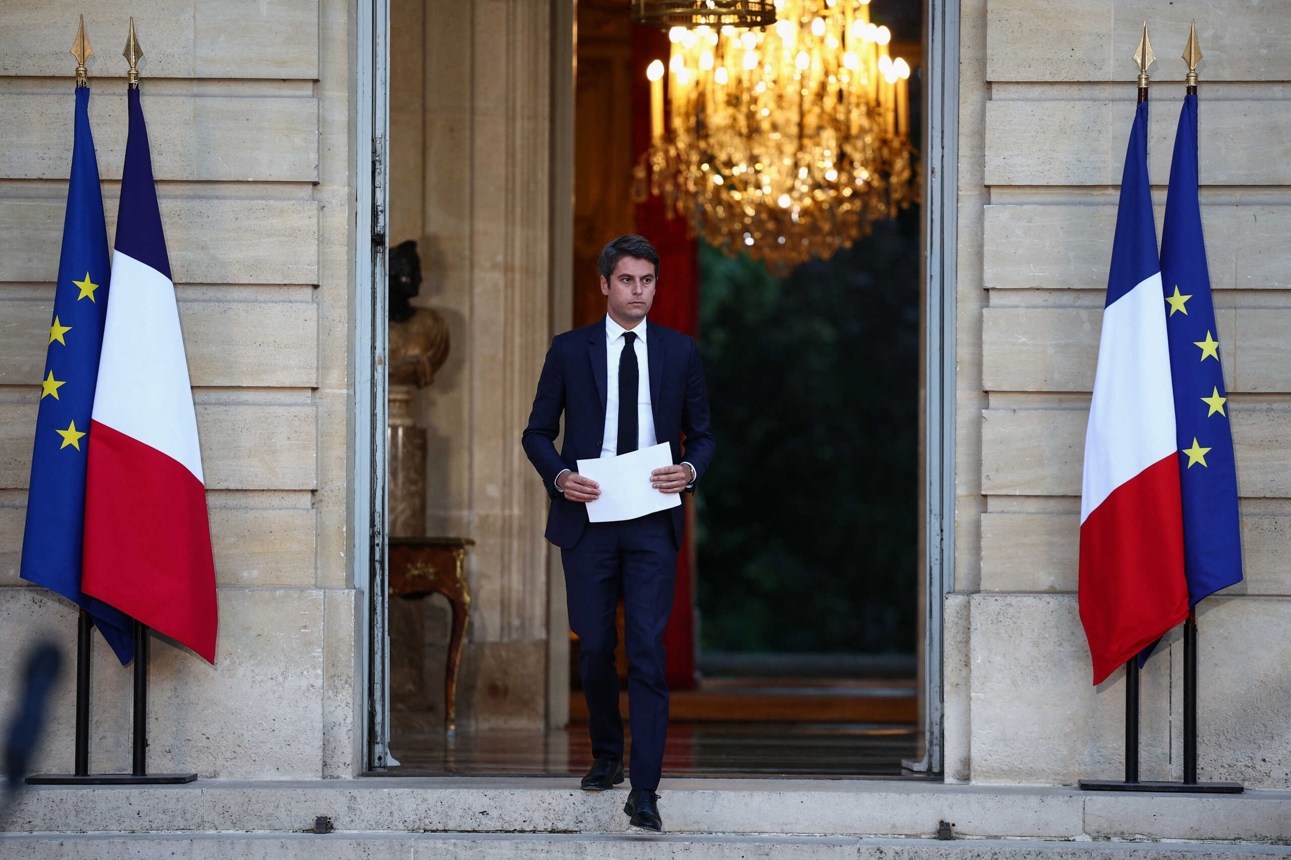 Gabriel Attal, French Prime Minister and French presidential majority group "Ensemble pour la Republique" candidate, arrives to deliver a speech after partial results in the second round of the early French parliamentary elections, at Hotel Matignon in Paris in Paris, France, July 7, 2024. REUTERS