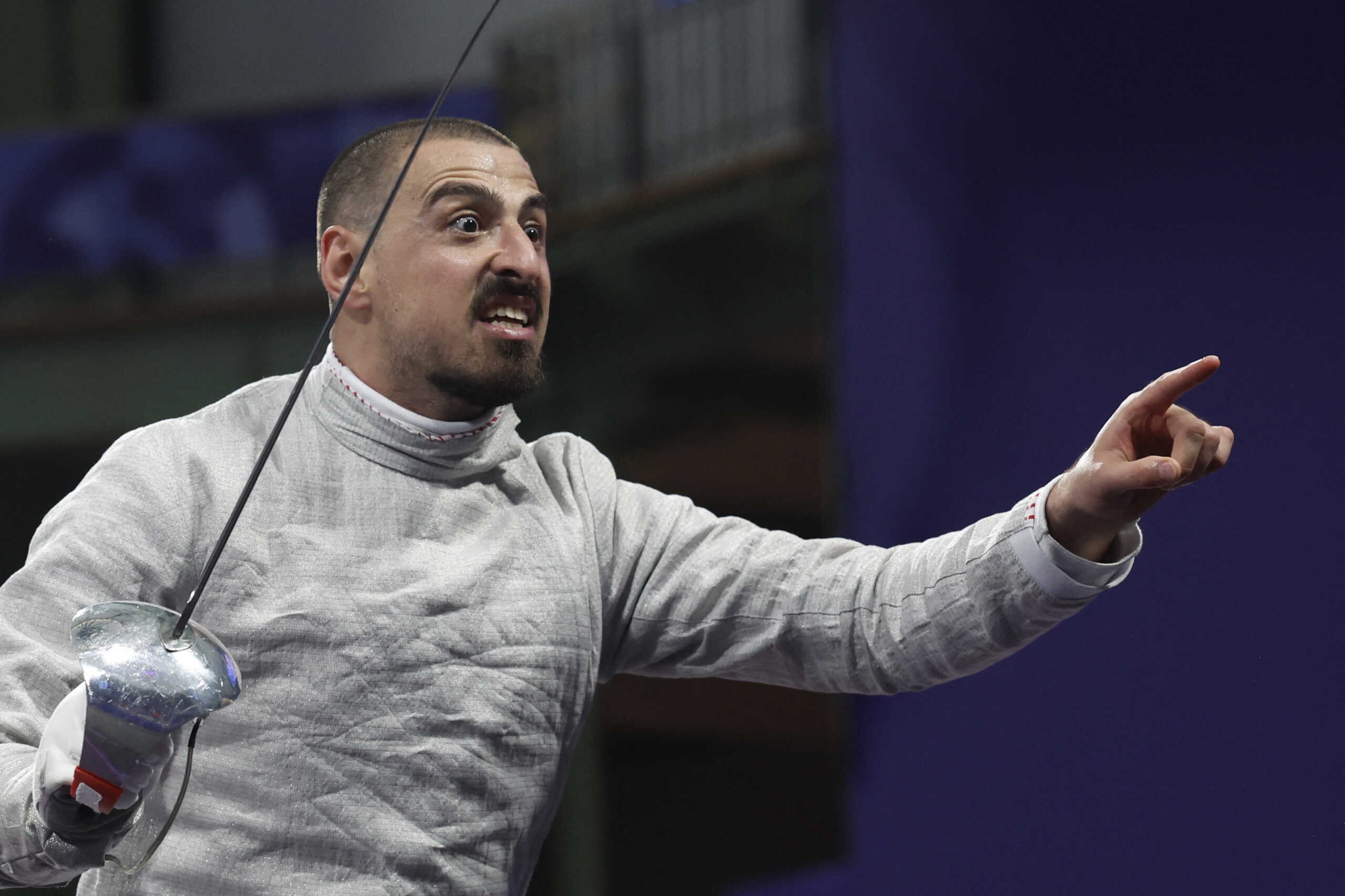 Paris 2024 Olympics - Fencing - Men's Sabre Individual Table of 16 - Grand Palais, Paris, France - July 27, 2024. Sandro Bazadze of Georgia argues with the referee. REUTERS