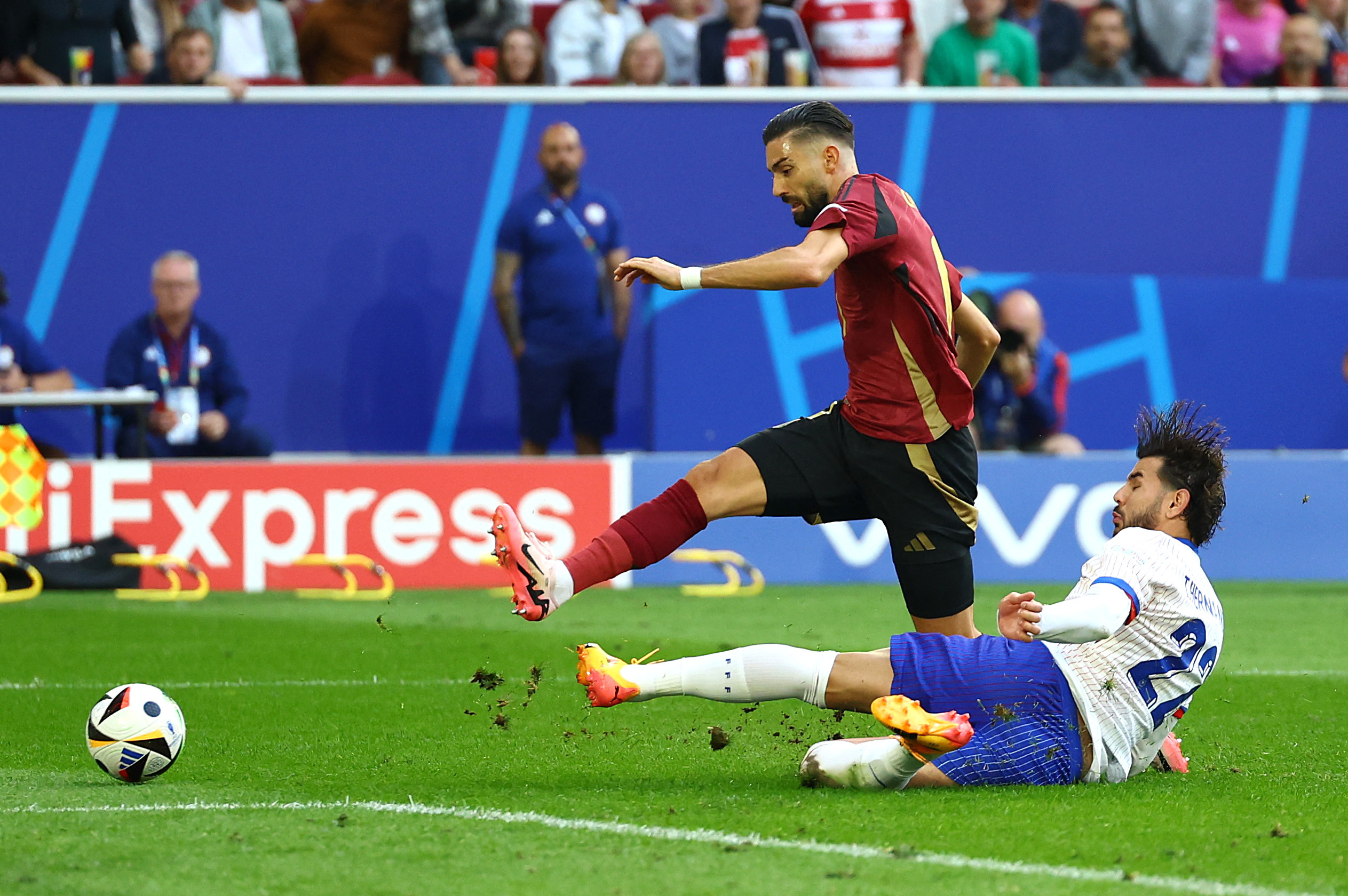 Soccer Football - Euro 2024 - Round of 16 - France v Belgium - Dusseldorf Arena, Dusseldorf, Germany - July 1, 2024 Belgium's Yannick Carrasco in action with France's Theo Hernandez REUTERS