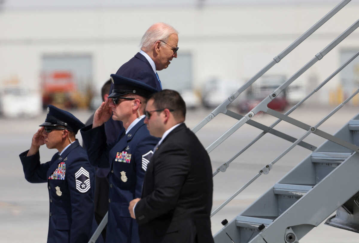 U.S. President Joe Biden boards Air Force One, at Harry Reid international airport in Las Vegas, Nevada, U.S., July 17, 2024. REUTERS