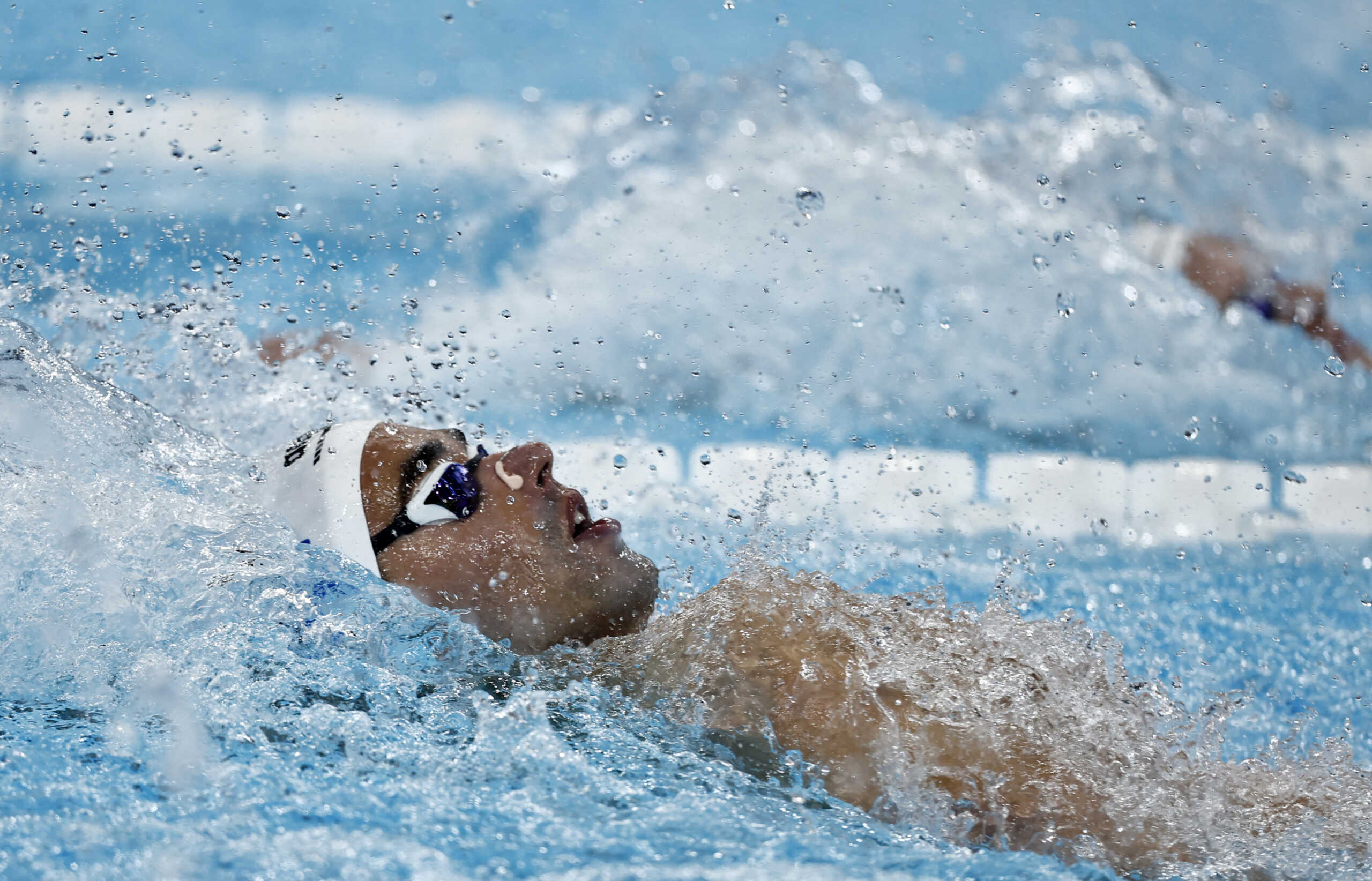 Paris 2024 Olympics - Swimming - Men's 100m Backstroke Semifinal 2 - Paris La Defense Arena, Nanterre, France - July 28, 2024.  Apostolos Christou of Greece in action. REUTERS