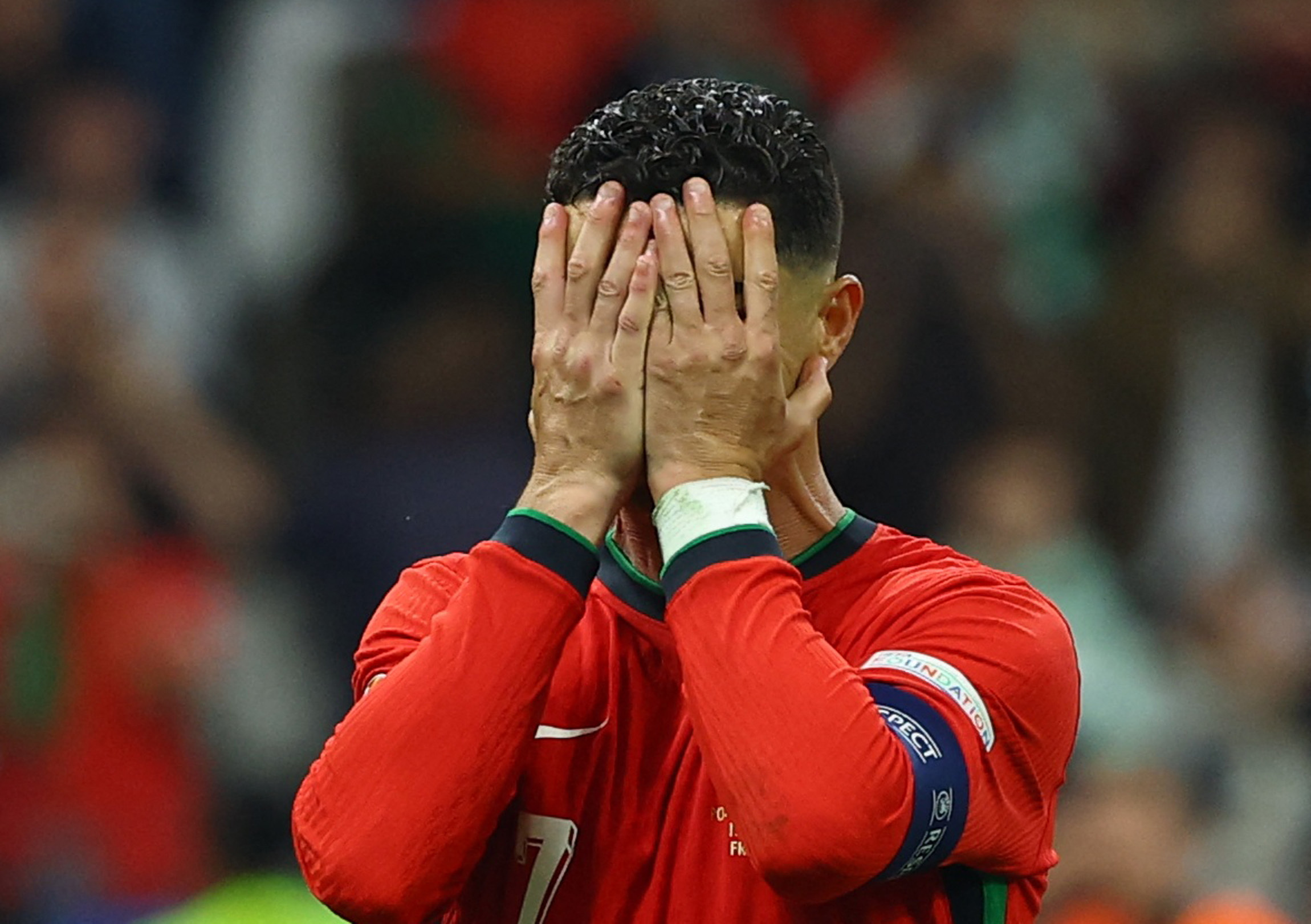 Soccer Football - Euro 2024 - Round of 16 - Portugal v Slovenia - Frankfurt Arena, Frankfurt, Germany - July 1, 2024  Portugal's Cristiano Ronaldo looks dejected after missing a penalty kick REUTERS