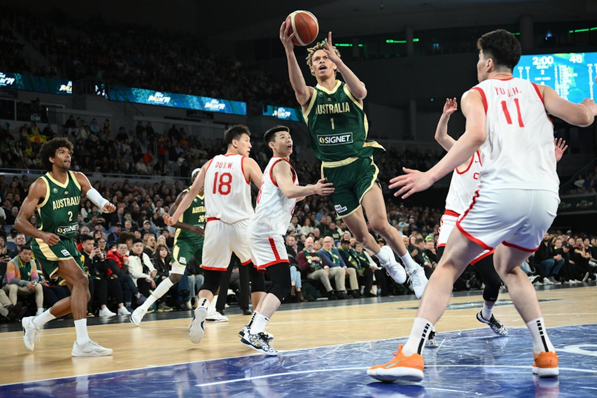epa11451984 Dyson Daniels of Australia drives for the basket during the Ford Ballin'24 Melbourne match between the Australian Boomers and China at John Cain Arena in Melbourne, Australia, 02 July 2024.  EPA
