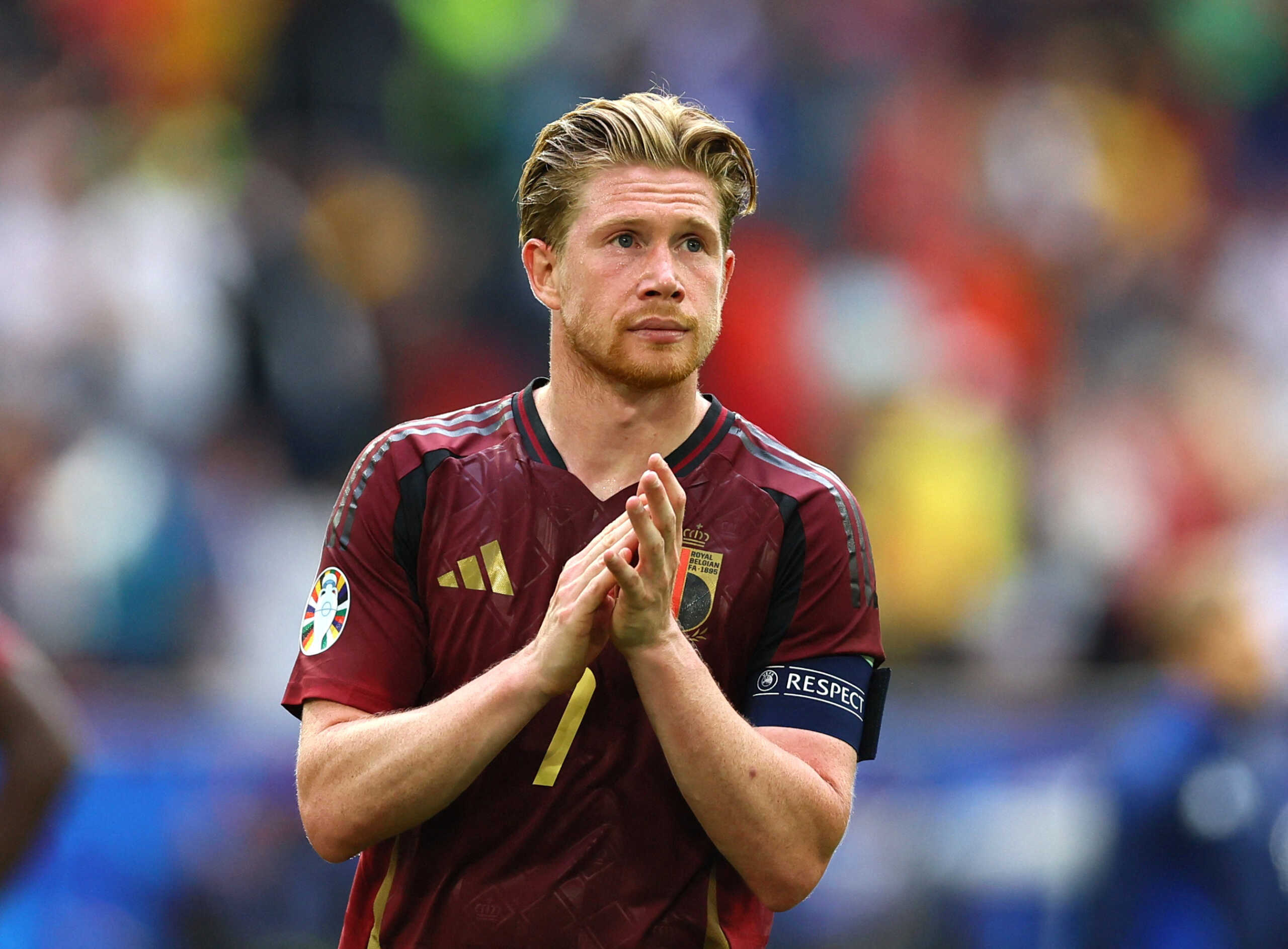 Soccer Football - Euro 2024 - Round of 16 - France v Belgium - Dusseldorf Arena, Dusseldorf, Germany - July 1, 2024 Belgium's Kevin De Bruyne looks dejected as he applauds fans after the match REUTERS
