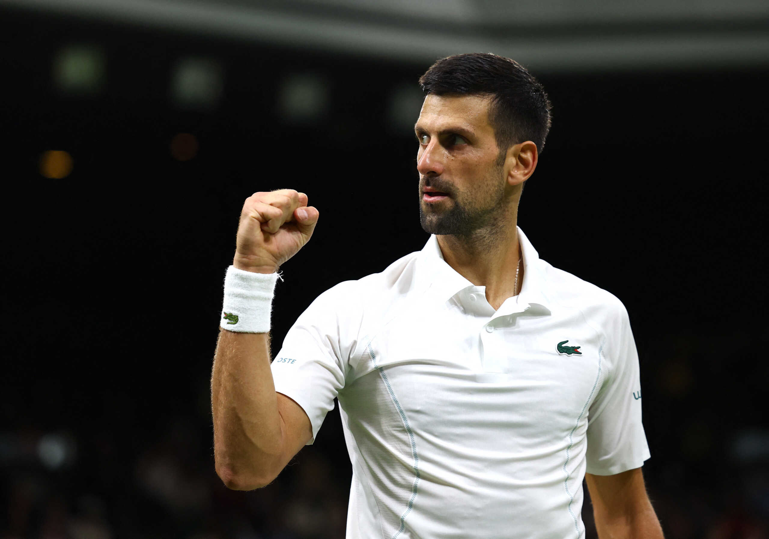 Tennis - Wimbledon - All England Lawn Tennis and Croquet Club, London, Britain - July 8, 2024 Serbia's Novak Djokovic celebrates after winning his fourth round match against Denmark's Holger Rune REUTERS