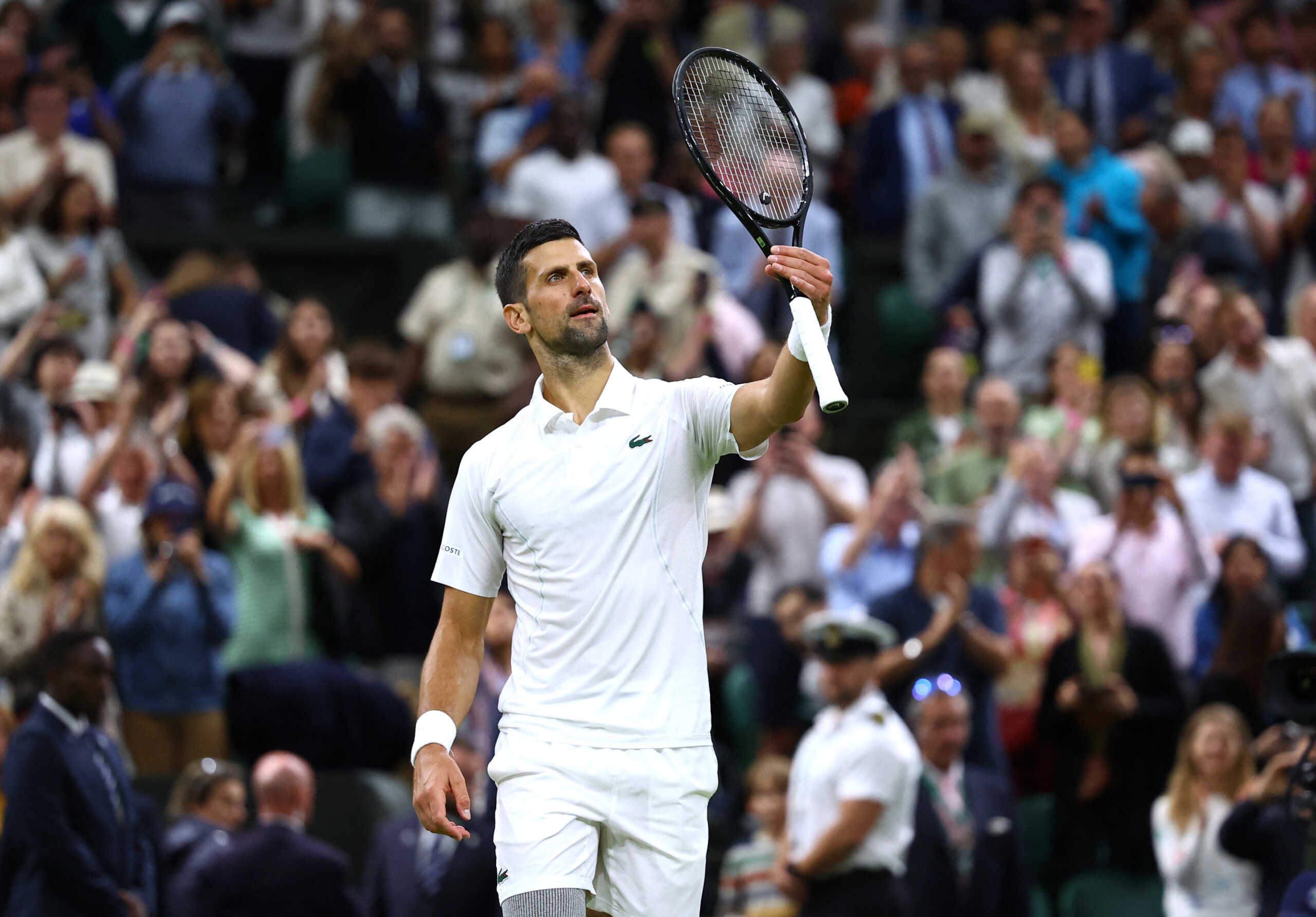 Tennis - Wimbledon - All England Lawn Tennis and Croquet Club, London, Britain - July 8, 2024 Serbia's Novak Djokovic celebrates after winning his fourth round match against Denmark's Holger Rune REUTERS